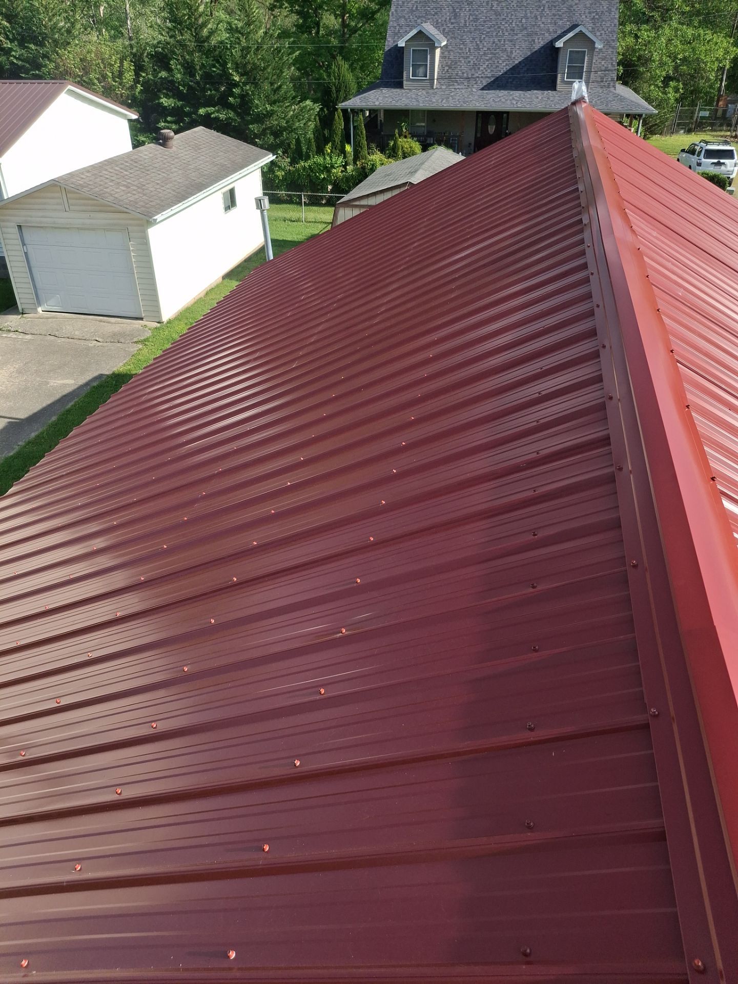 Residential Roofing Installation using Metal by Rainstoppers Roofing