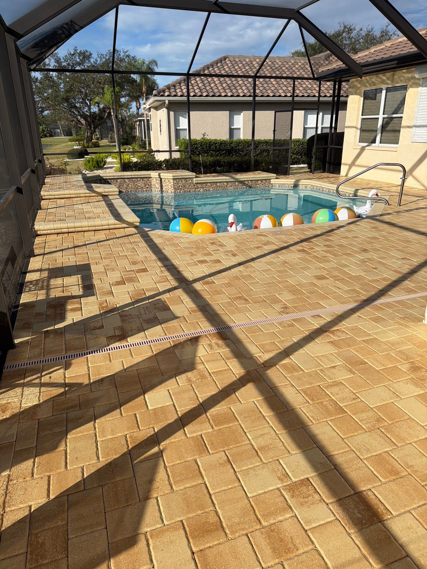 Custom Tan Paver Pool Deck and Patio in Sun City Center by Supreme Paver Experts