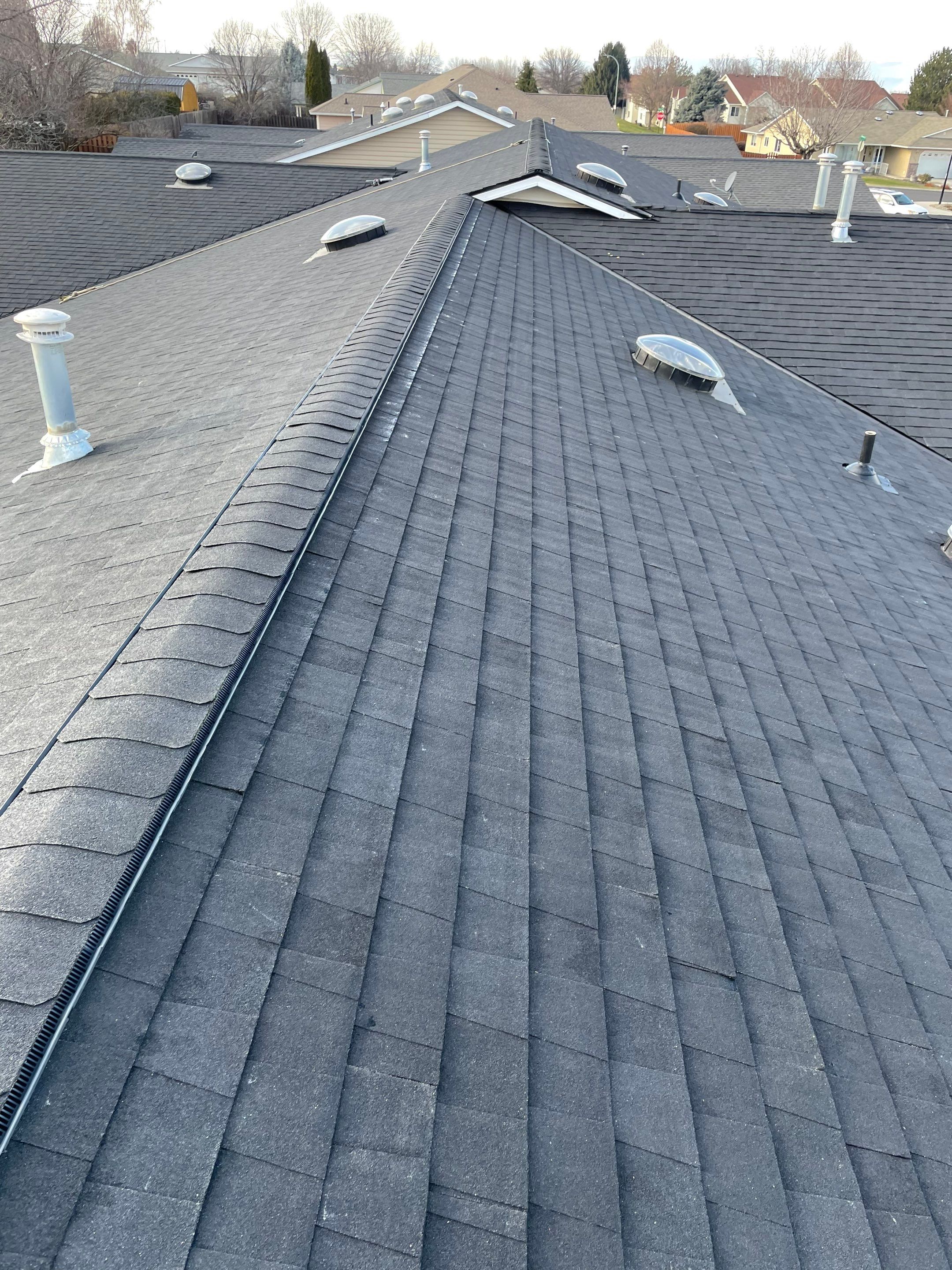 Complete Roof Replacement and Skylight Integration in Lewiston by Alpine Roofing