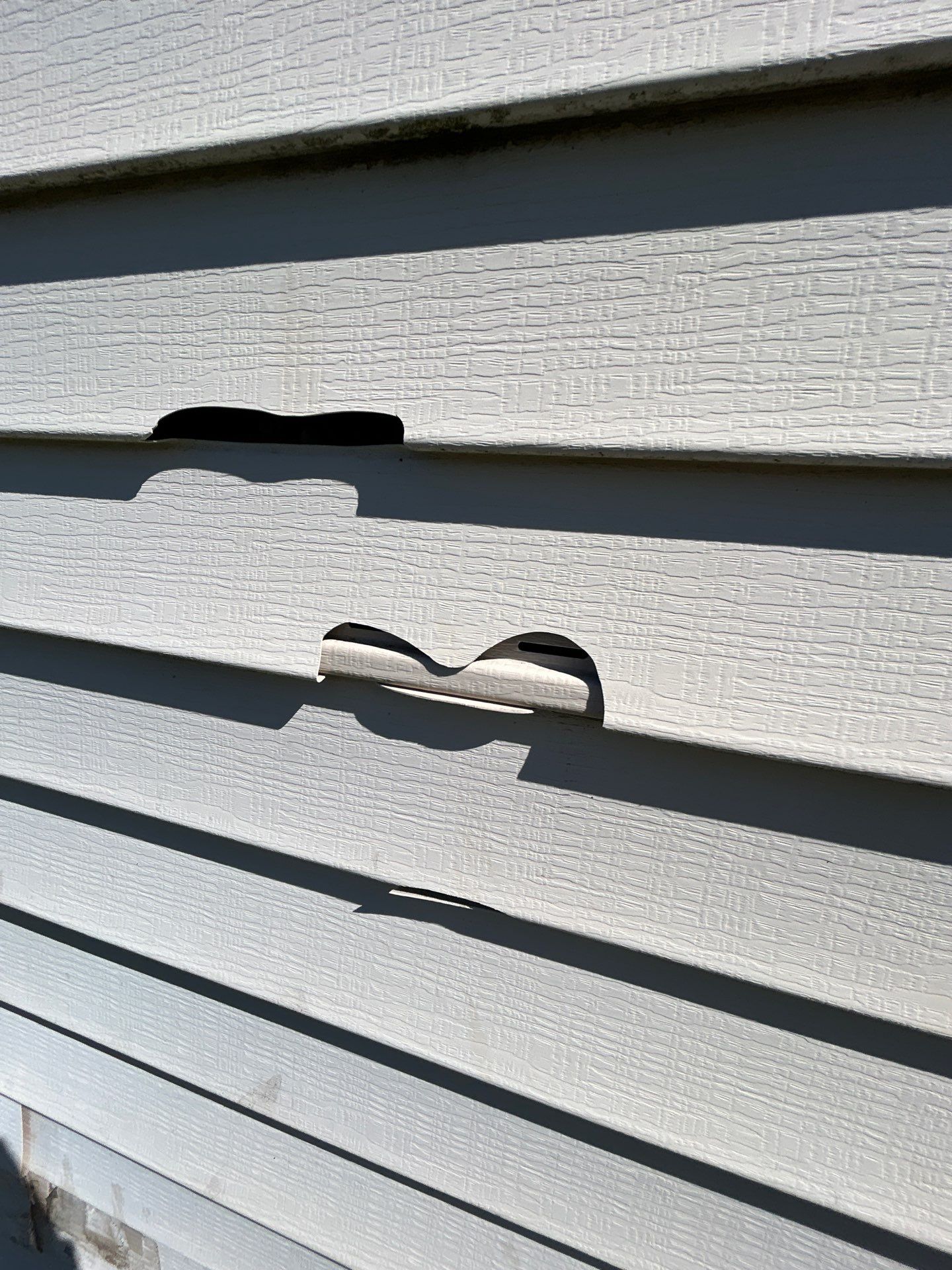 Storm Damage Residential Roof and Siding Installation by WIW Enterprises Inc