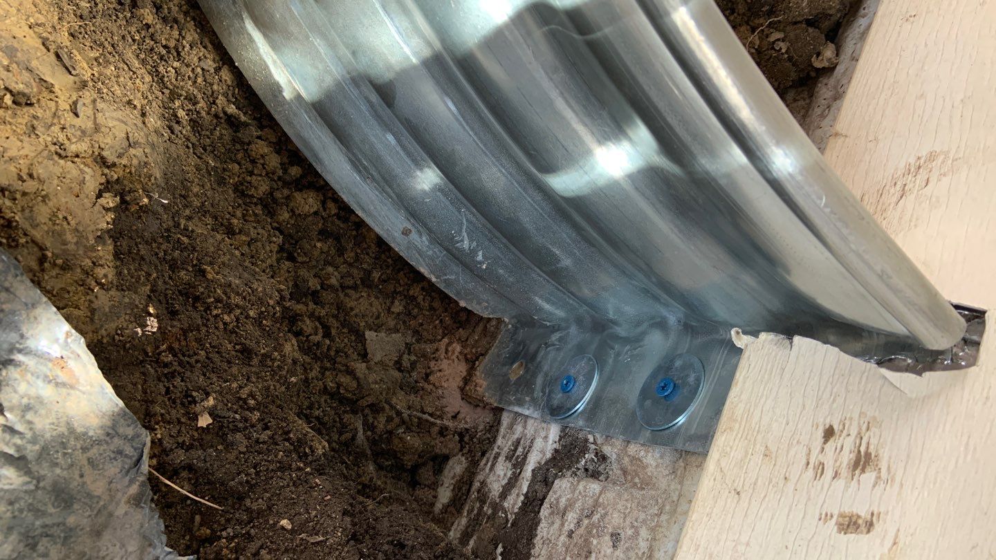 Basement Window Well & Drainage Board in Maple Grove, MN by Waterproofing Northeast