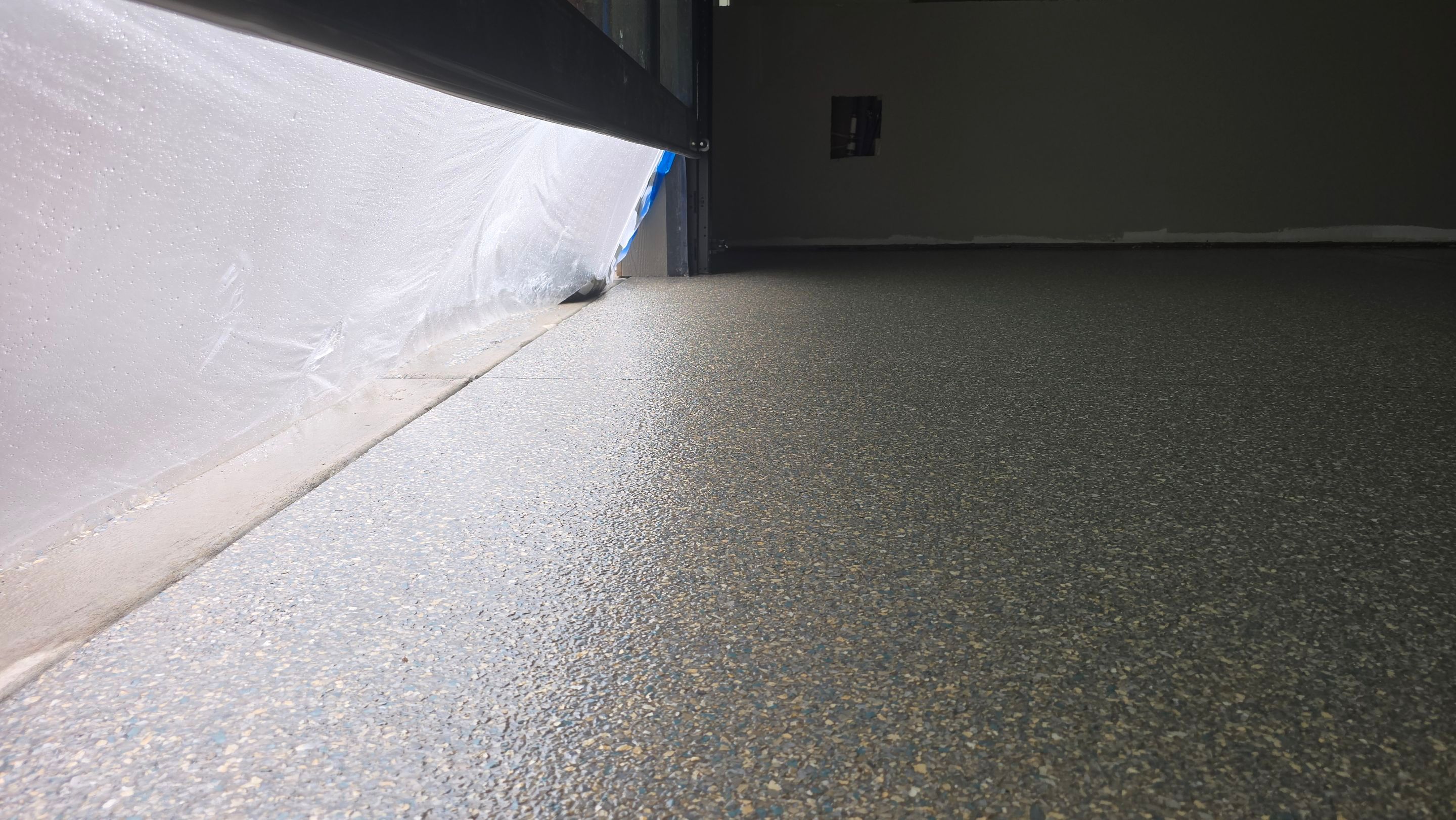 Shop Floor Using Custom Flake by Elite Floor Solutions