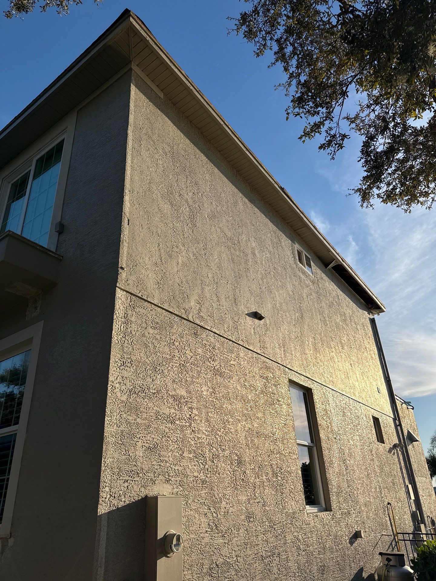 Soffit and Fascia Installation and black seamless gutters in Sarasota FL by Gutter Professors