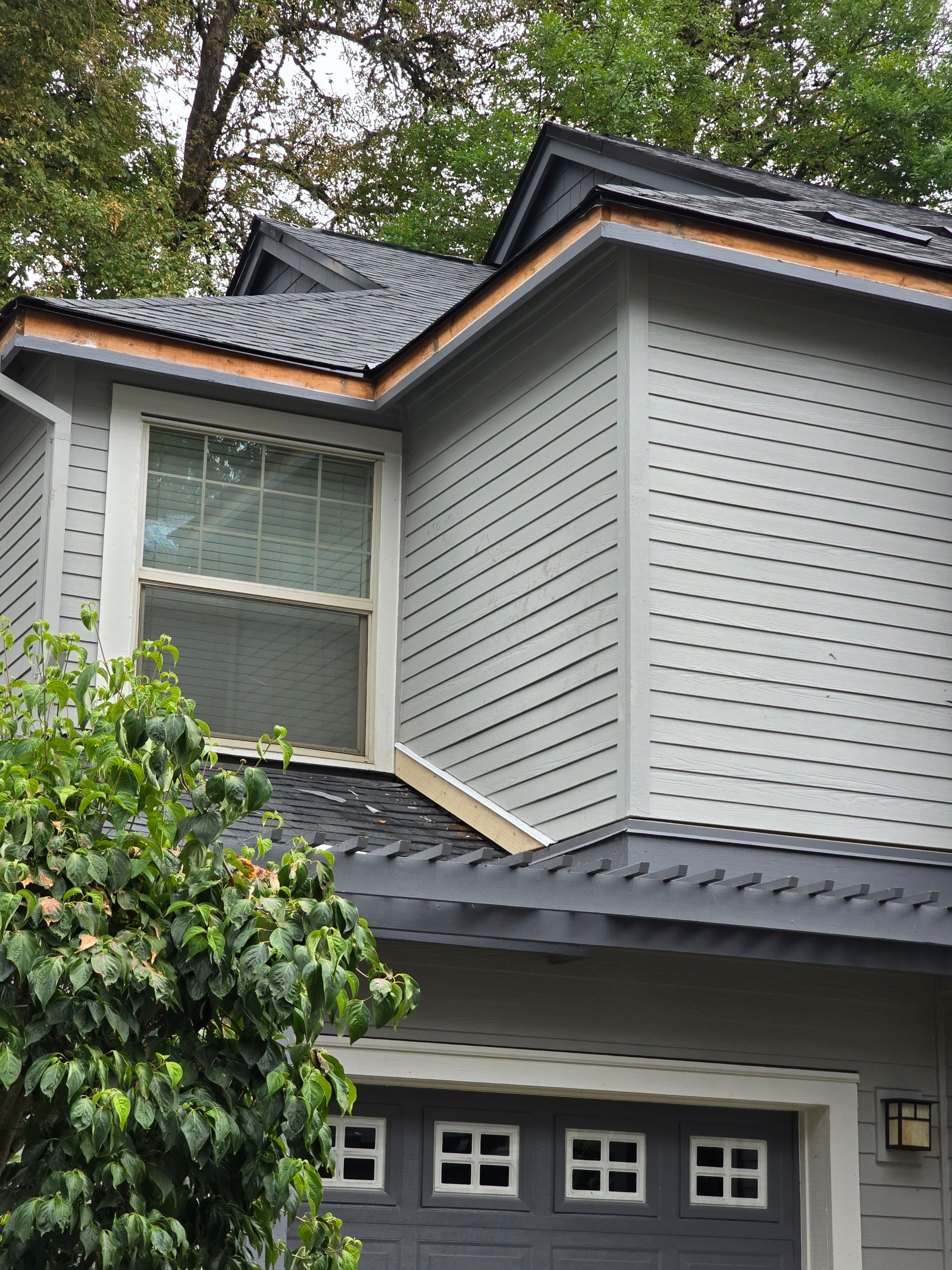 Dawson Station Reroof and Gutters by Hawthorne General Construction