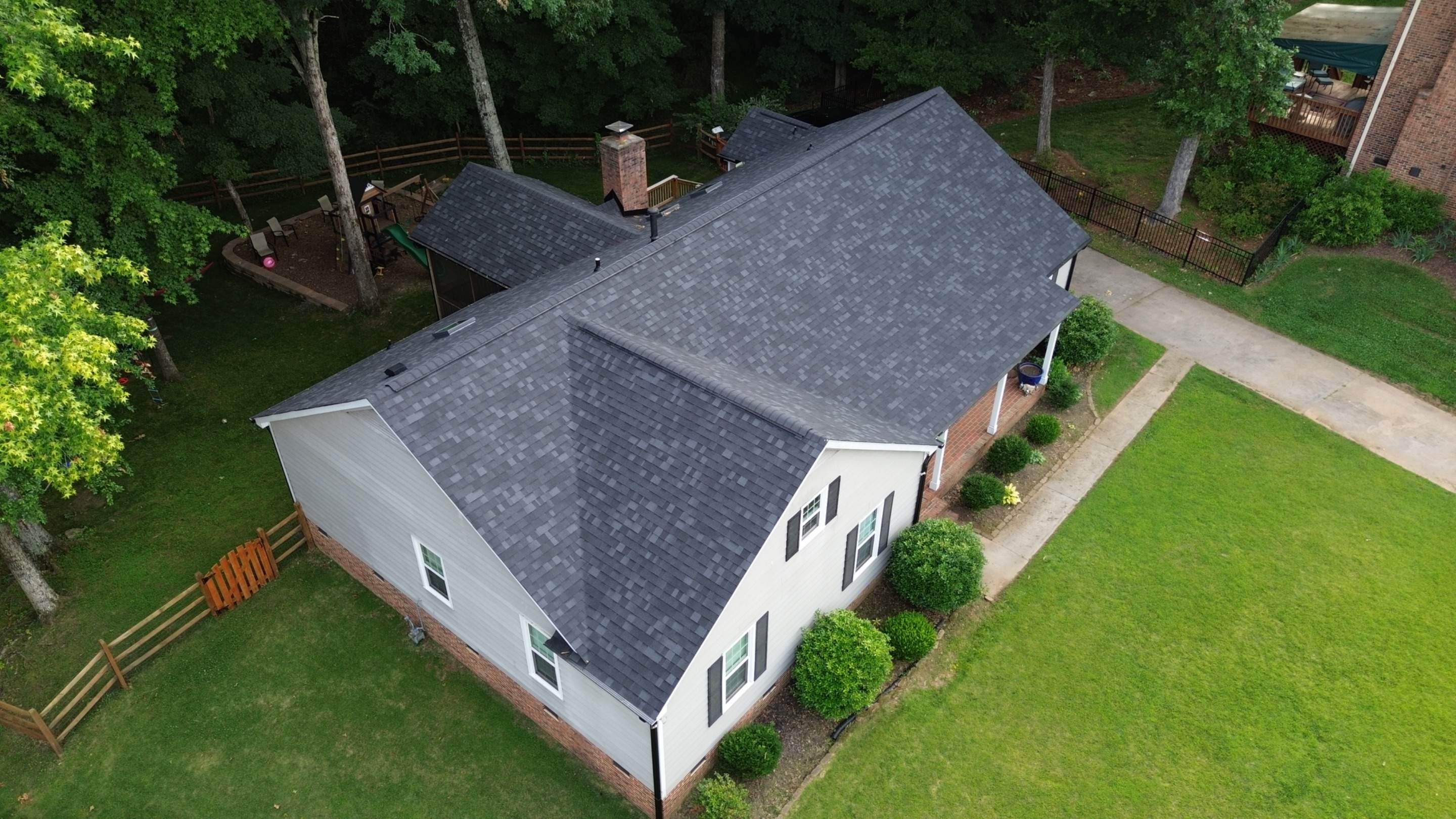 Residential Roof Replacement and Gutter Installation in Charlotte, NC by Merritt Roofing LLC
