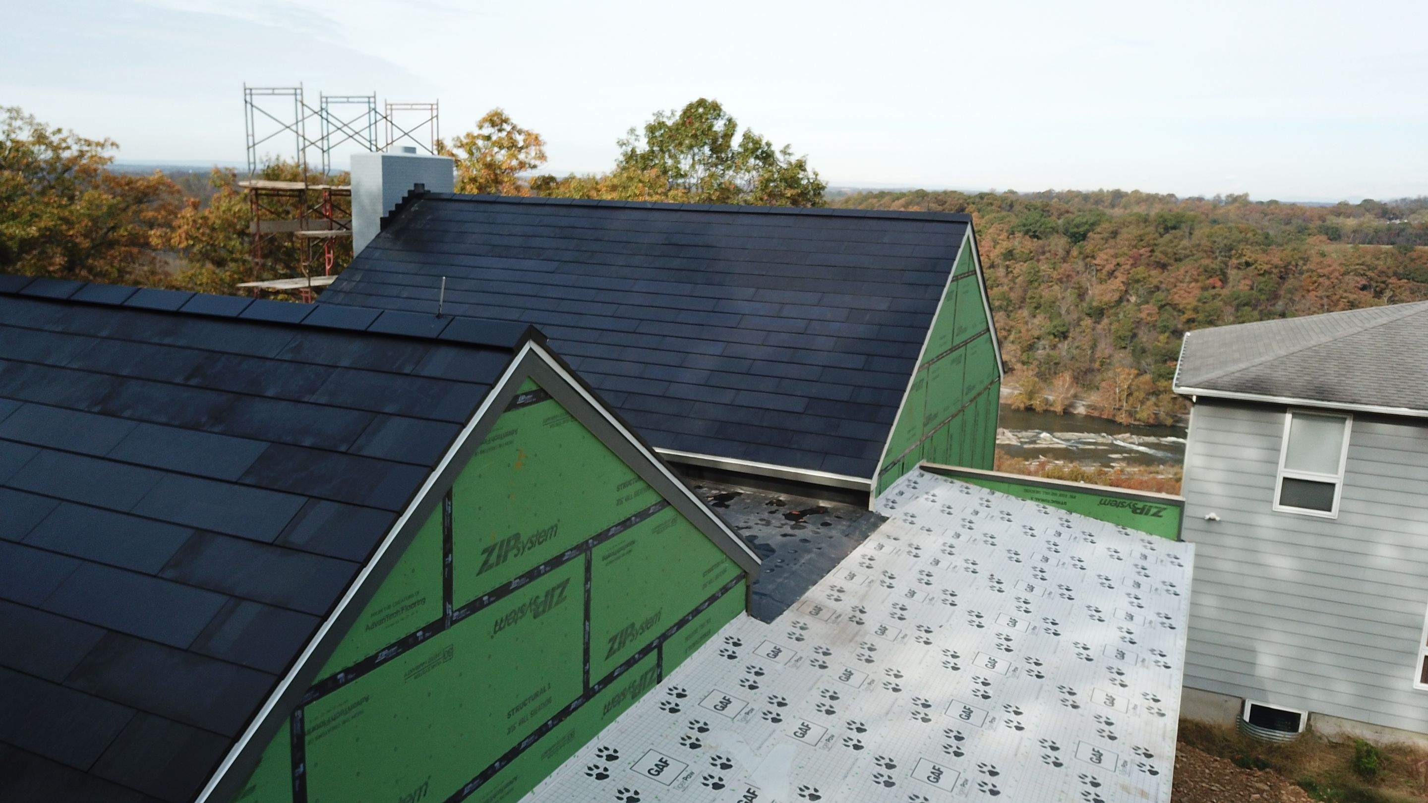 Roof Installation using Tesla Solar Roof V3 by American Home Contractors