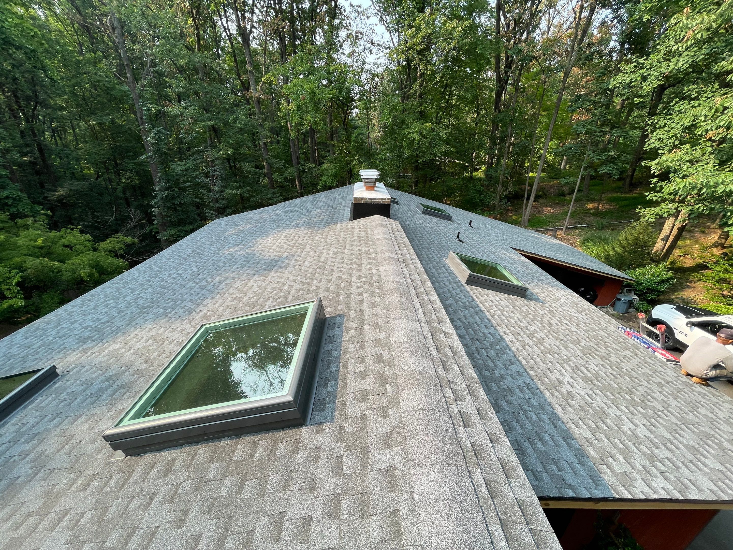 Deckhouse Roof Replacement by American Home Contractors