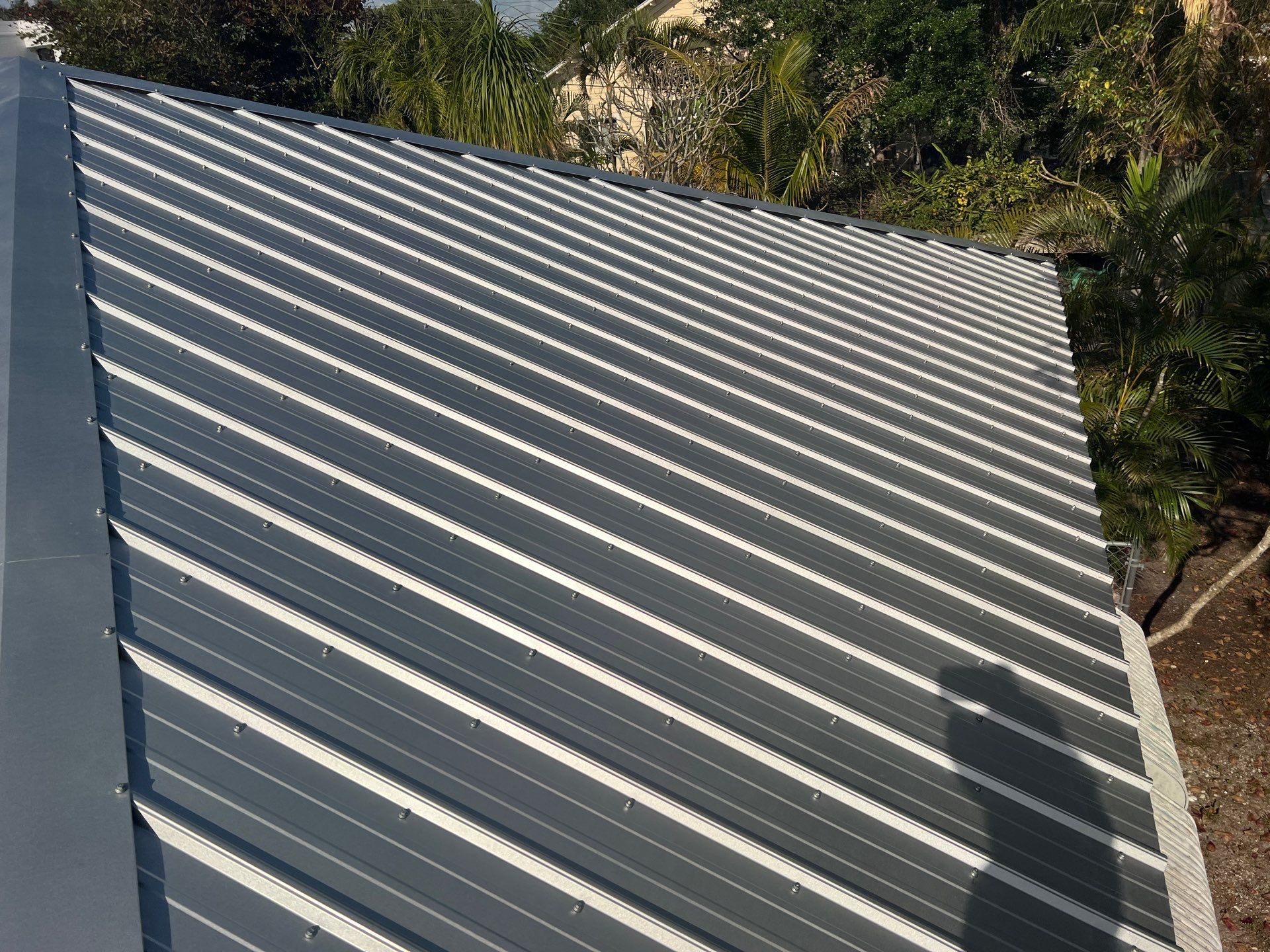 Residential Roofing Installation using Durabull Classic Rib Panel by Durabilis Roofing INC