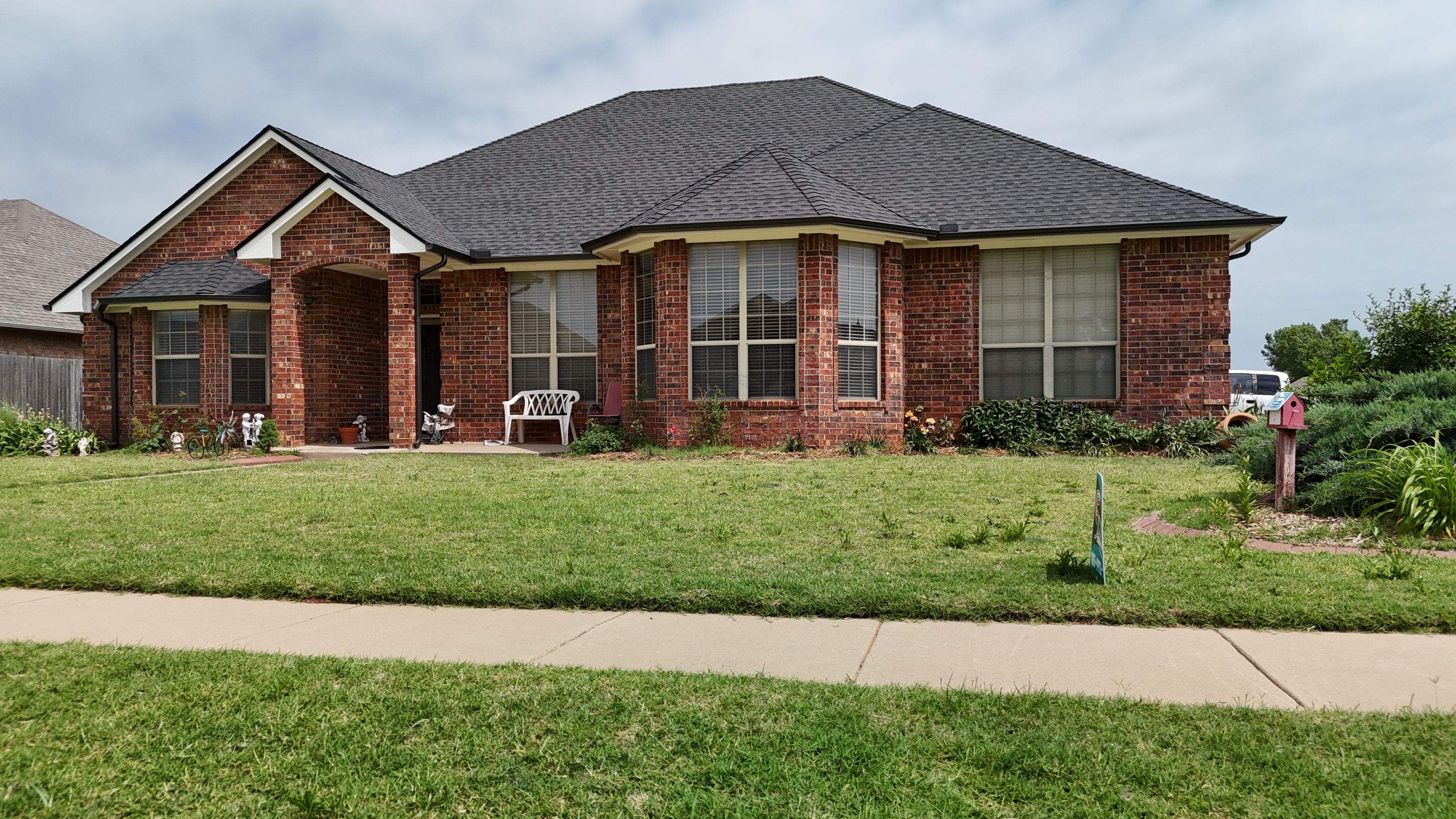 Roof Replacement in Mustang, OK by 5Coat Roofing & Construction