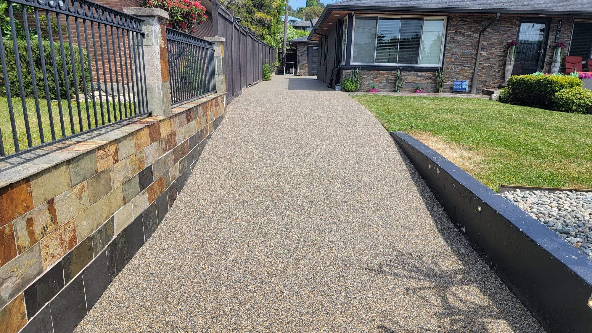 The Versailles Vuba Elegance Driveway by Concrete Coating Experts Inc.
