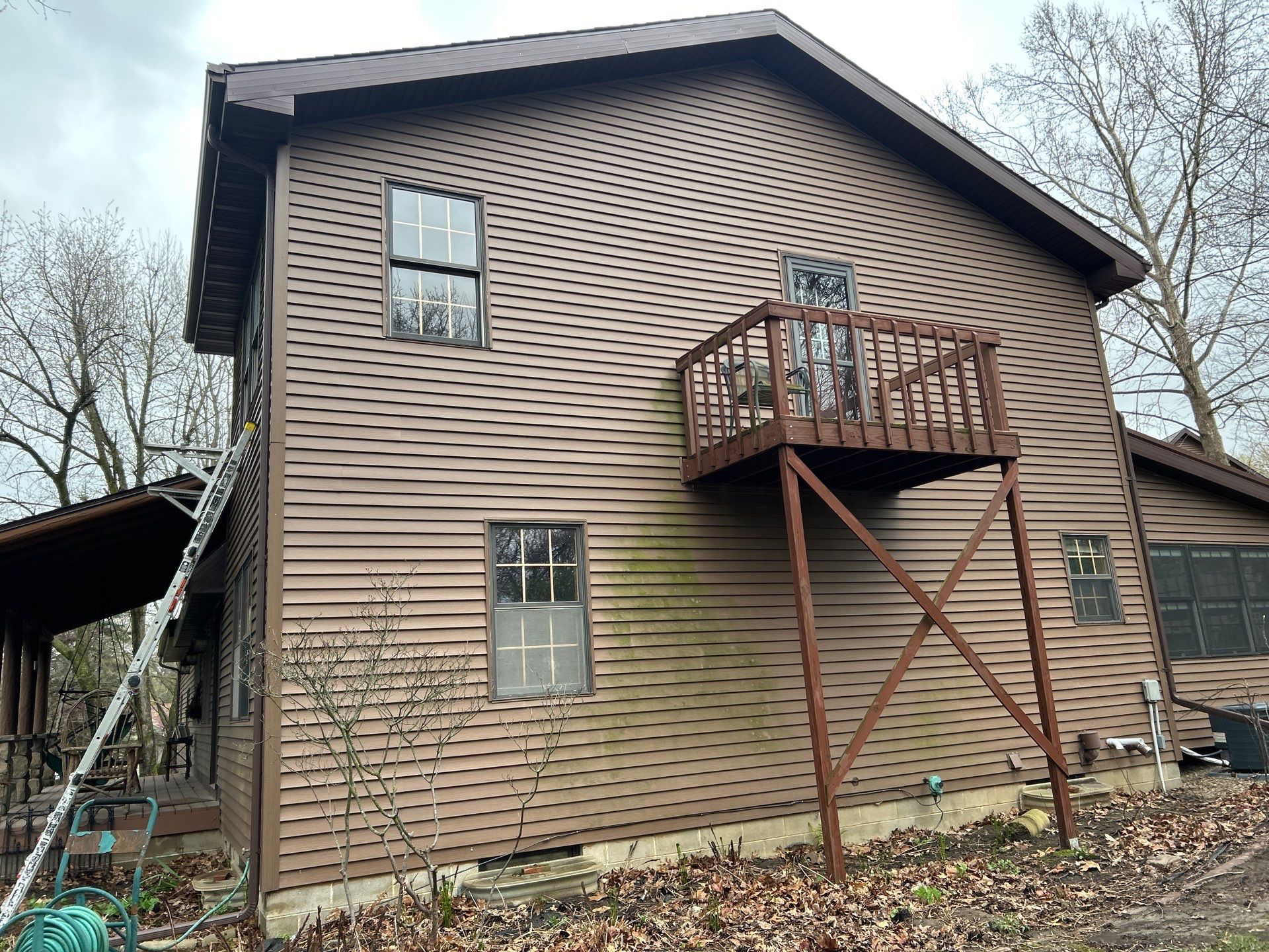 Pella Window installation using Pella Lifestyle wood/Aluminum window by United Windows and Siding LLC