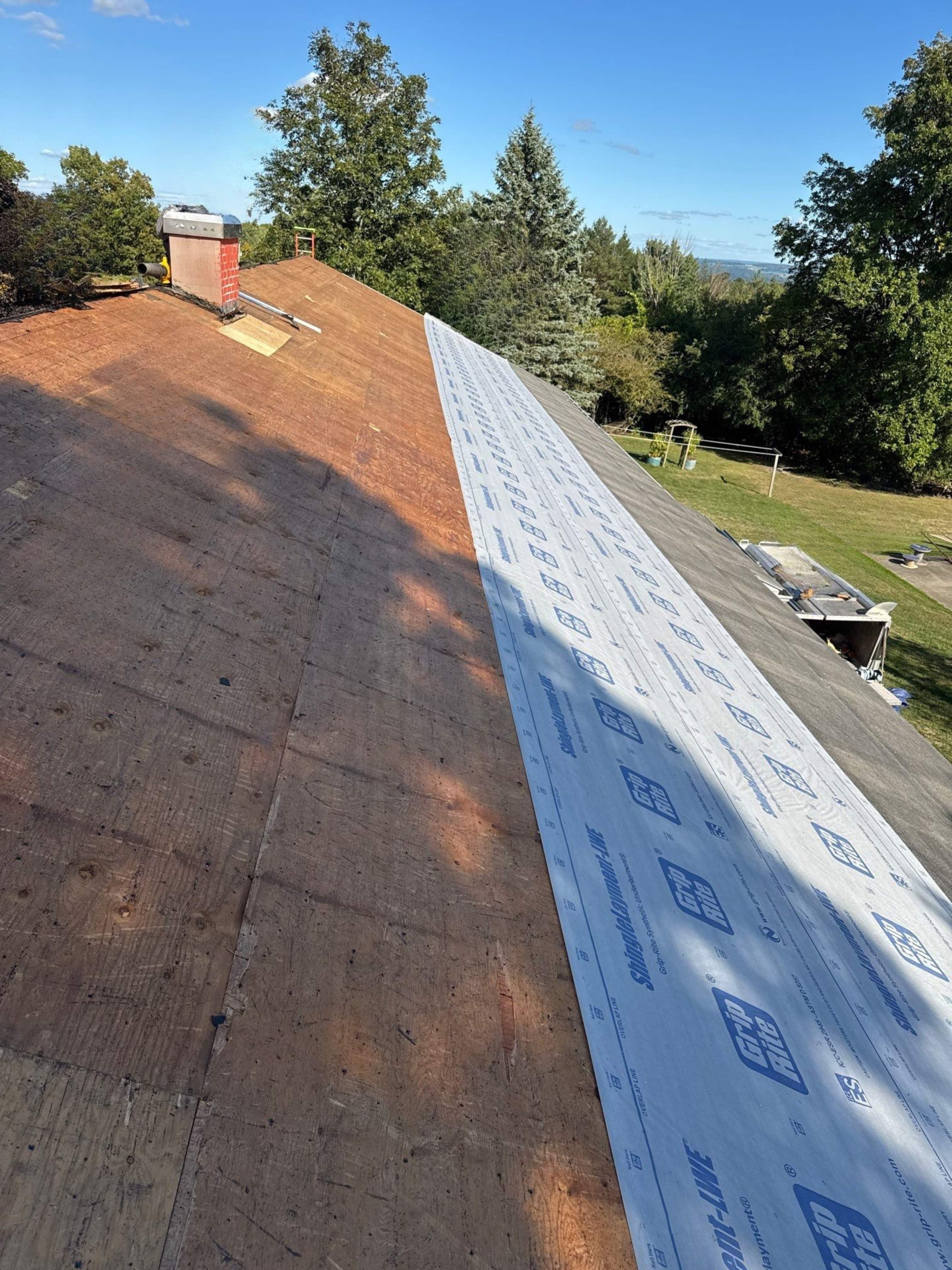 New roof  by Horst Custom Homes 