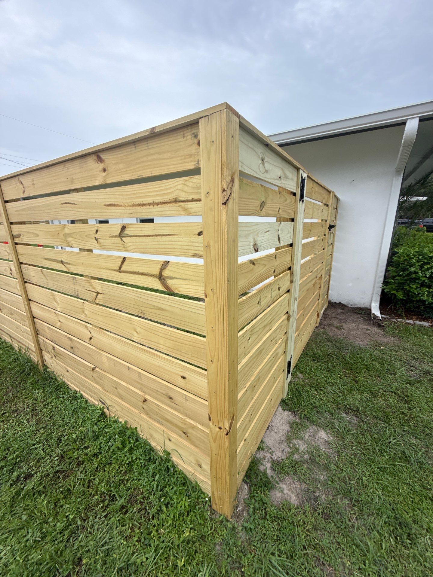 Modern Horizontal Wood Privacy Fence Installation in Fort Myers by True Fence LLC