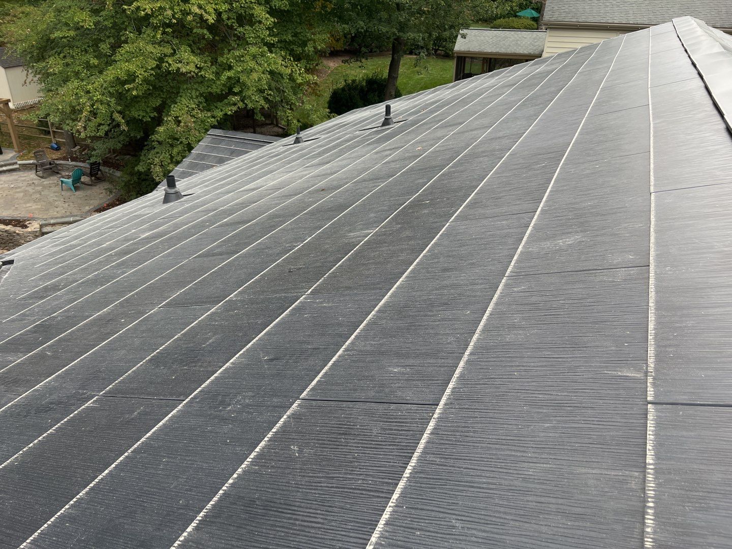 Tesla Solar Roof Replacement using Tesla Solar Roof V3 Tiles by American Home Contractors