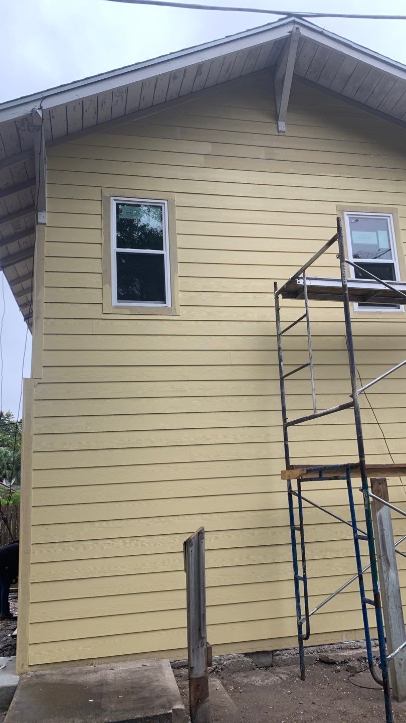 Up Town, Up Class by Bayfront Roofing and Construction
