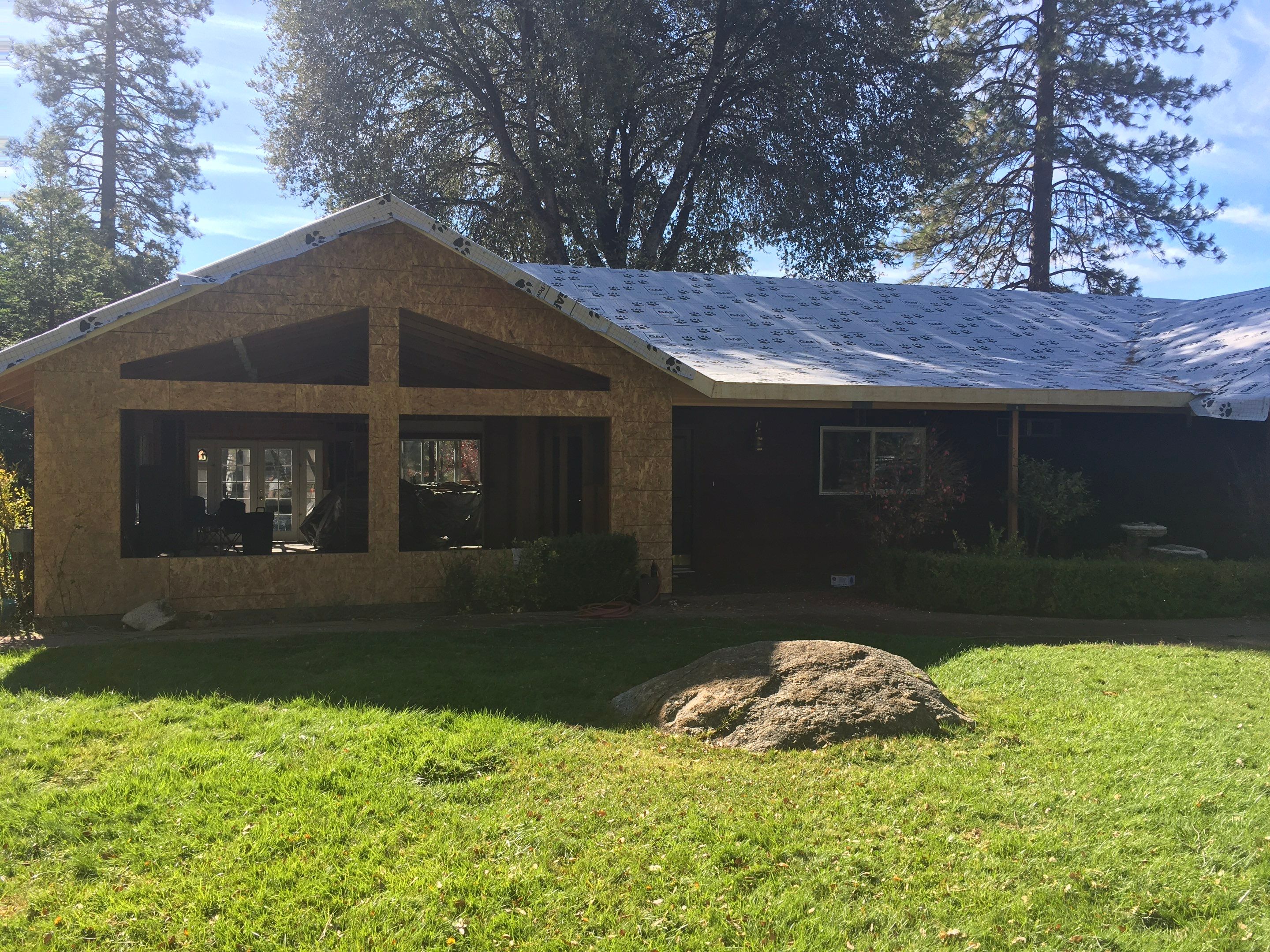 Metal roofing installation using Standing seam metal roofing system by Straight Edge Roofing Inc