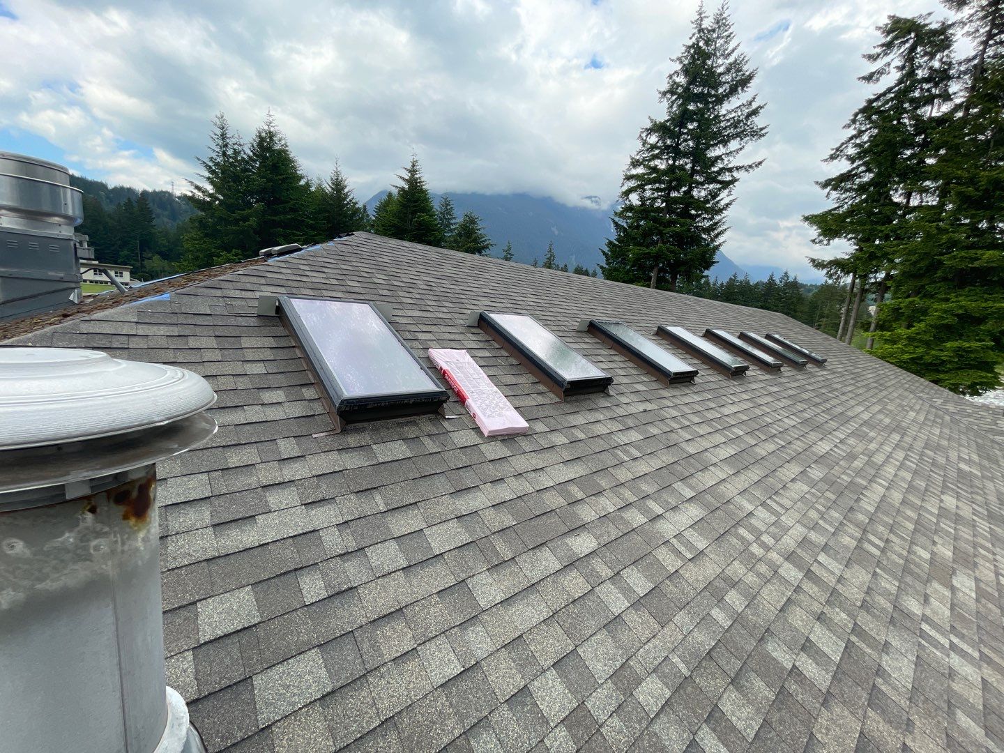 Residential ReRoofing Installation using OC Oakridge shingles by Top Notch Roofing Inc