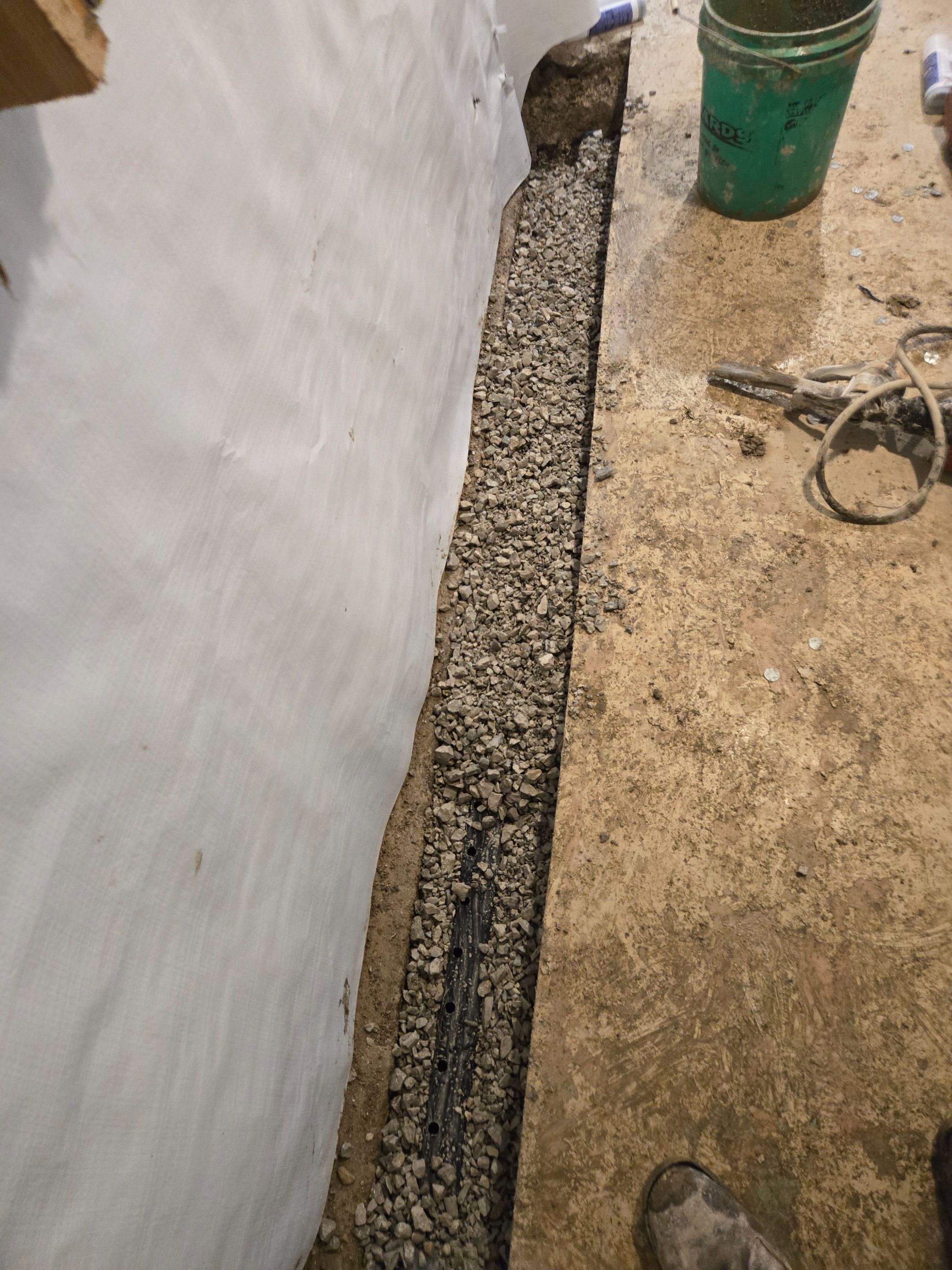 Interior Waterproofing using Drain Tile/White Cap by Allied Water Services