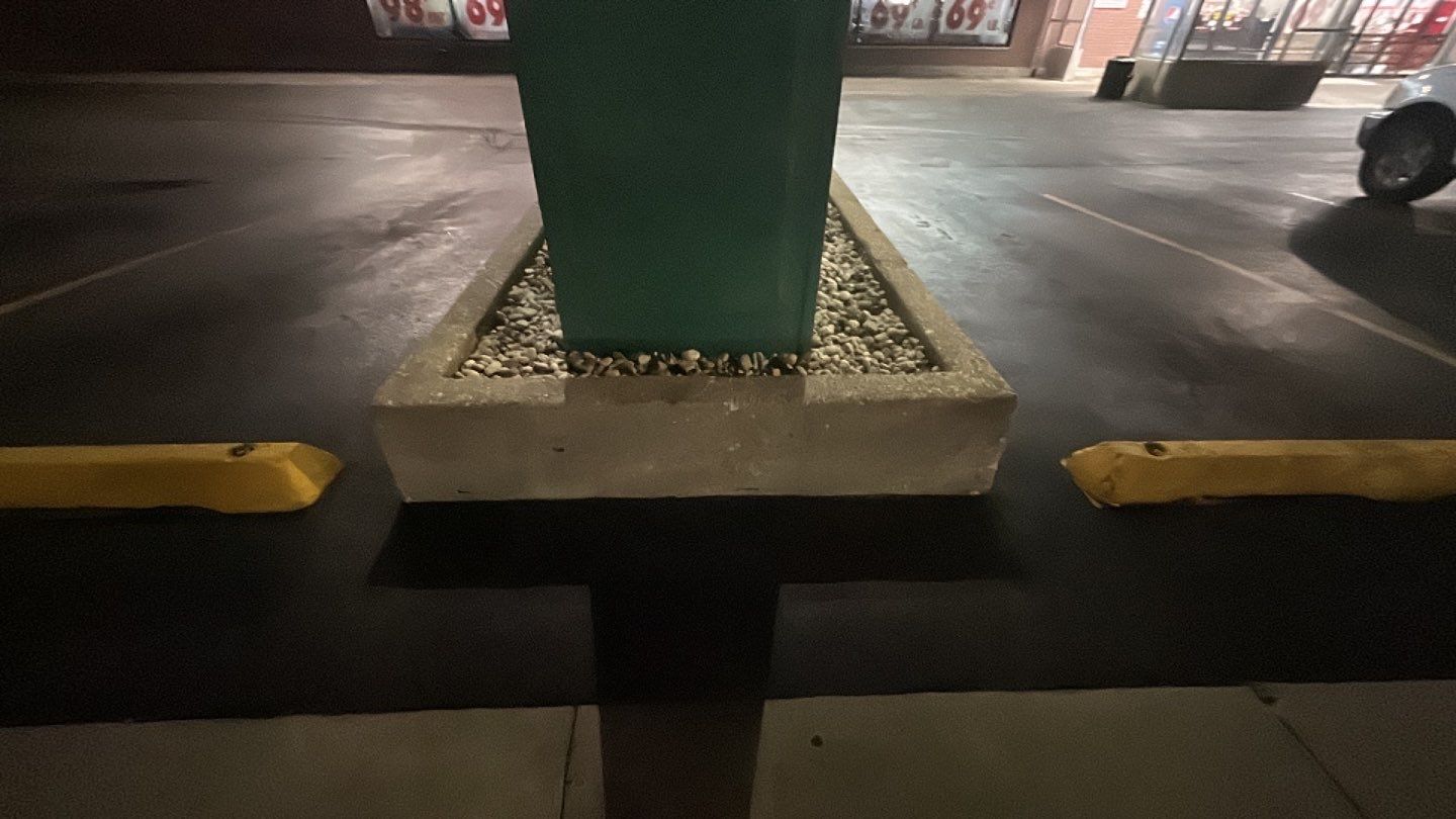 Concrete sidewalk cleaning and degreasing by Northern Power Washing LLC.