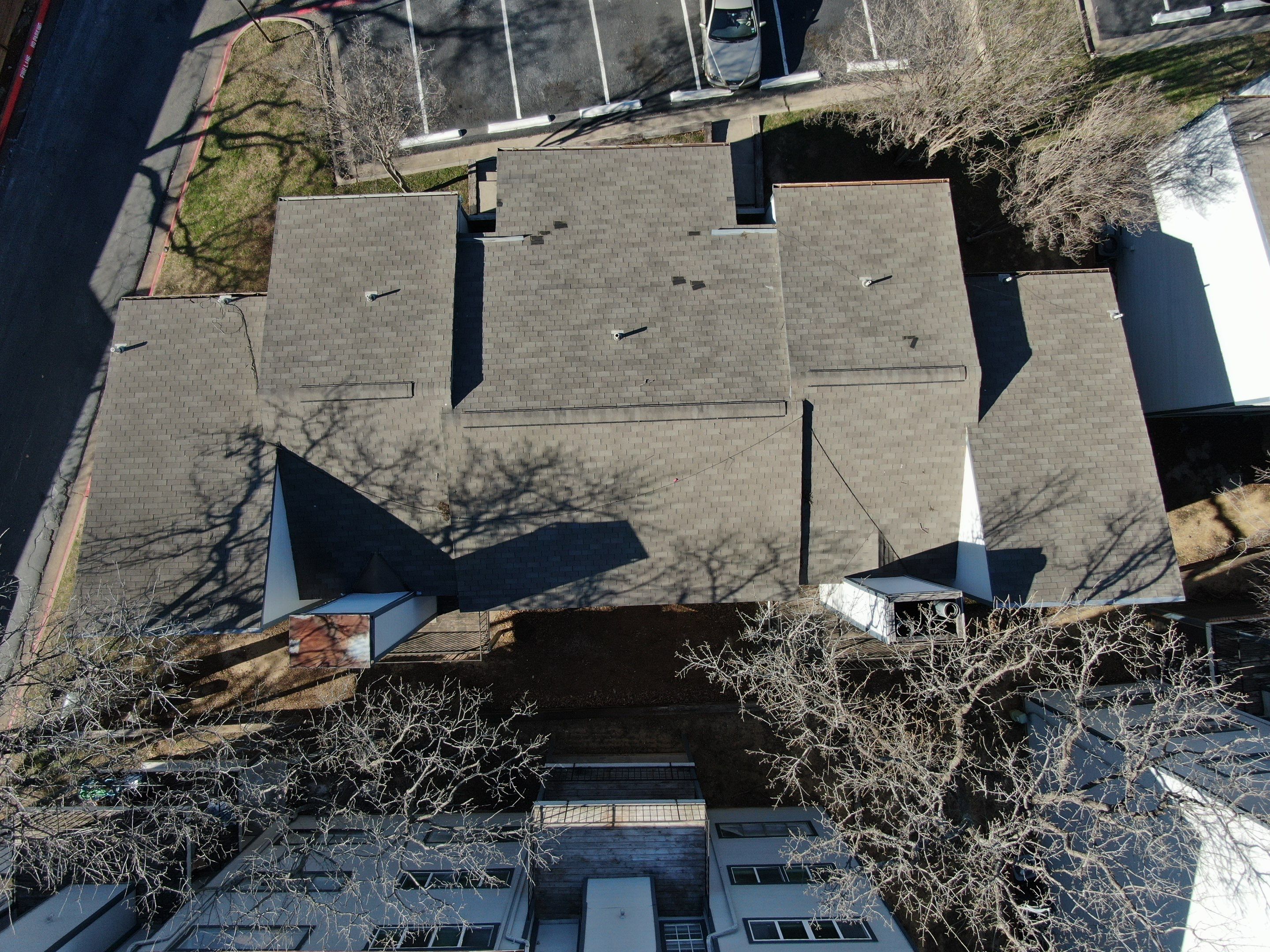 Apartment Roofing Repairs using Certainteed xt25 by Becker Roofing and Exteriors