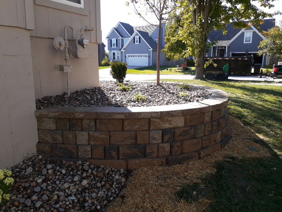 Front Yard Elevated landscape by LAND ESCAPES LLC