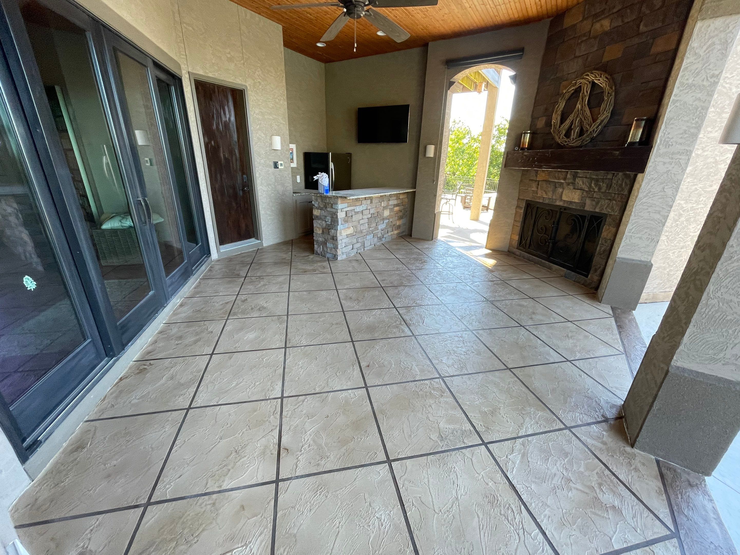 Lake Lotawana -- Front Walkway and Back Patio Tuscan Overlay by Big Red Decorative Concrete, LLC