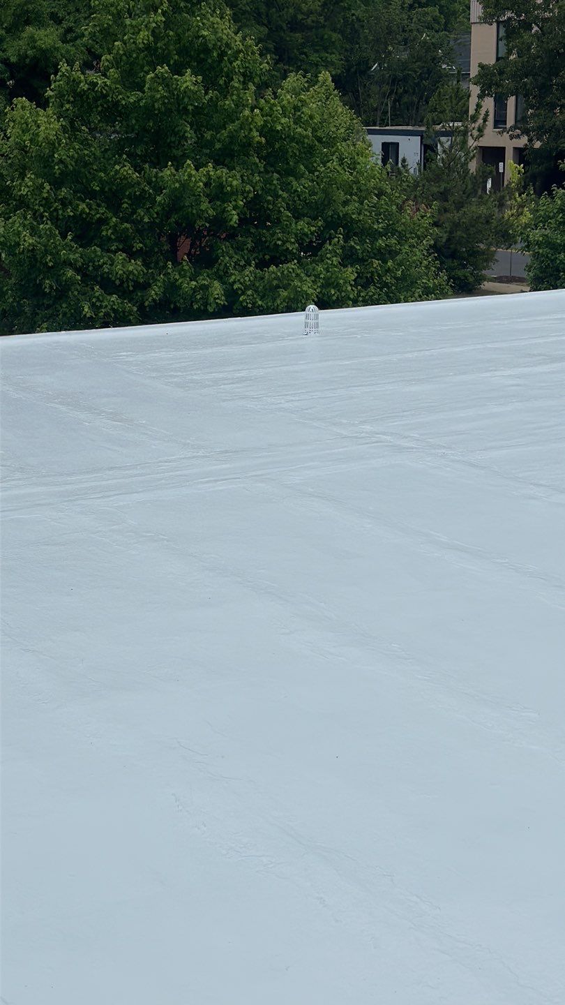 Roof Installation using Silicone TPO by ExteriorPros