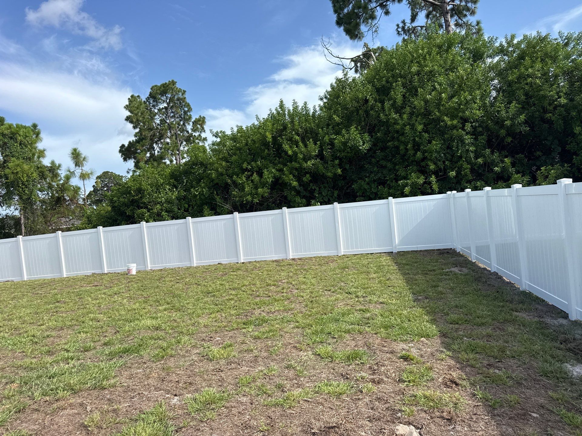 White Vinyl Privacy Fence and Gate Installation in Port Charlotte by True Fence LLC