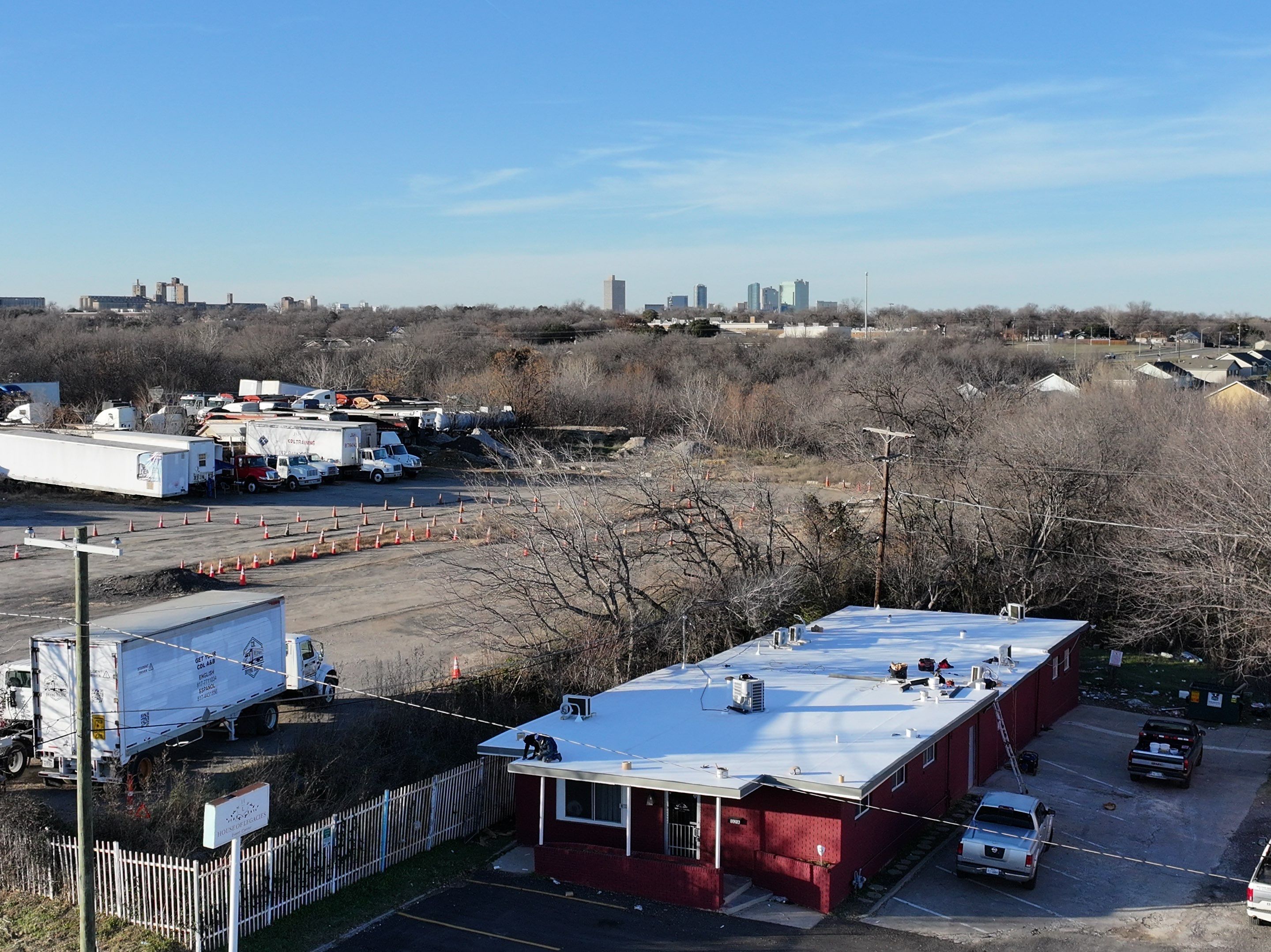 Commercial roofing overlay using GAF TPO over an old ballast roof by Becker Roofing and Exteriors