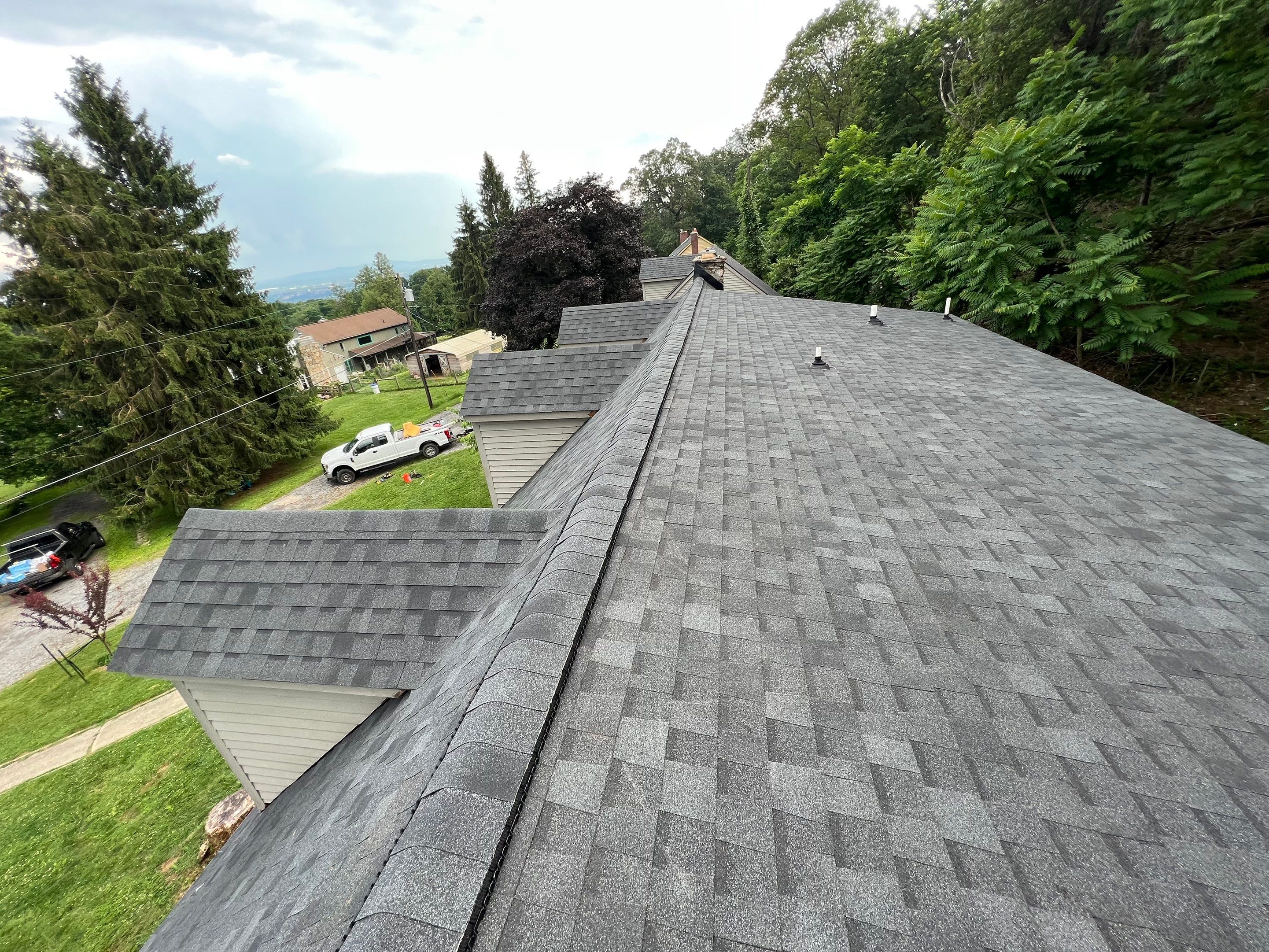 Residential Roofing Installation using Atlas Pinnacle Pristine Black Architectural Shingles by Frederick Roof Repair