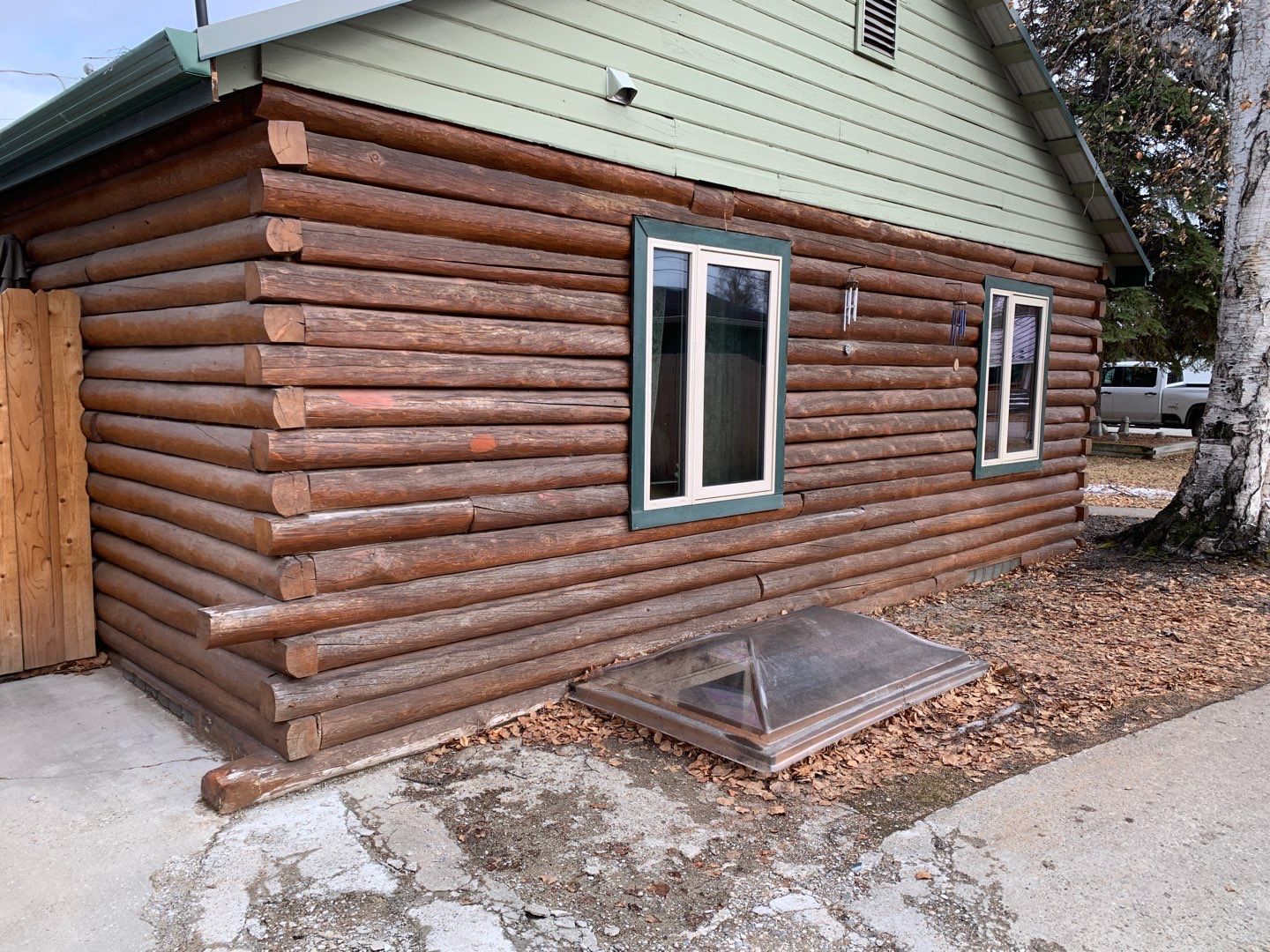 Log Home Exterior Staining by Midnight Sun Painting