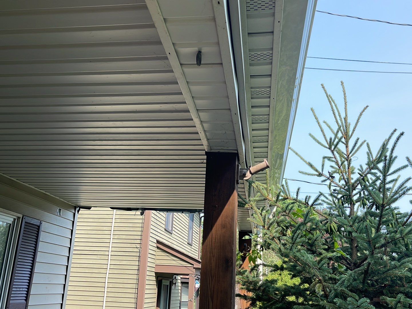 Gutter Installation using 5k White gutters by A Plus Exterior