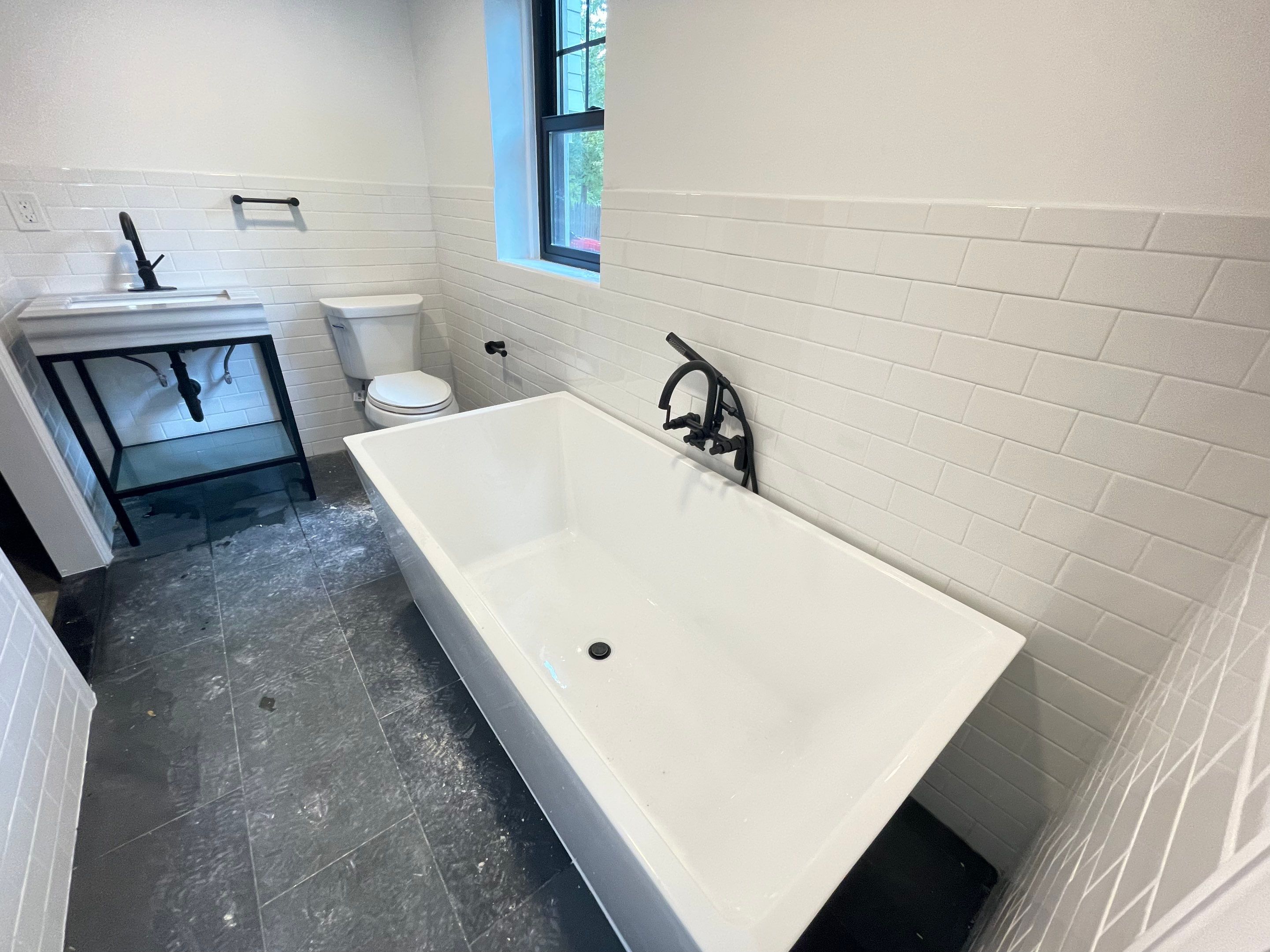 Basement Remodel using Tile by Home Concepts Construction