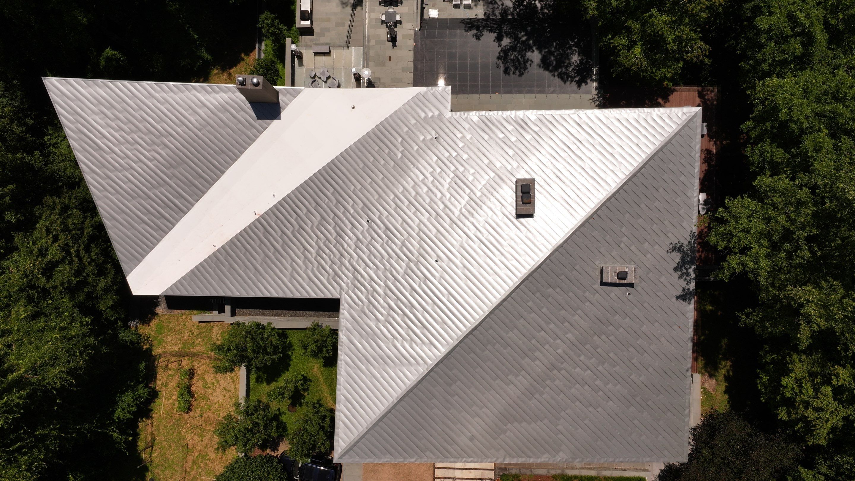 Modern Standing Seam Metal Roof Installation in McLean by American Home Contractors