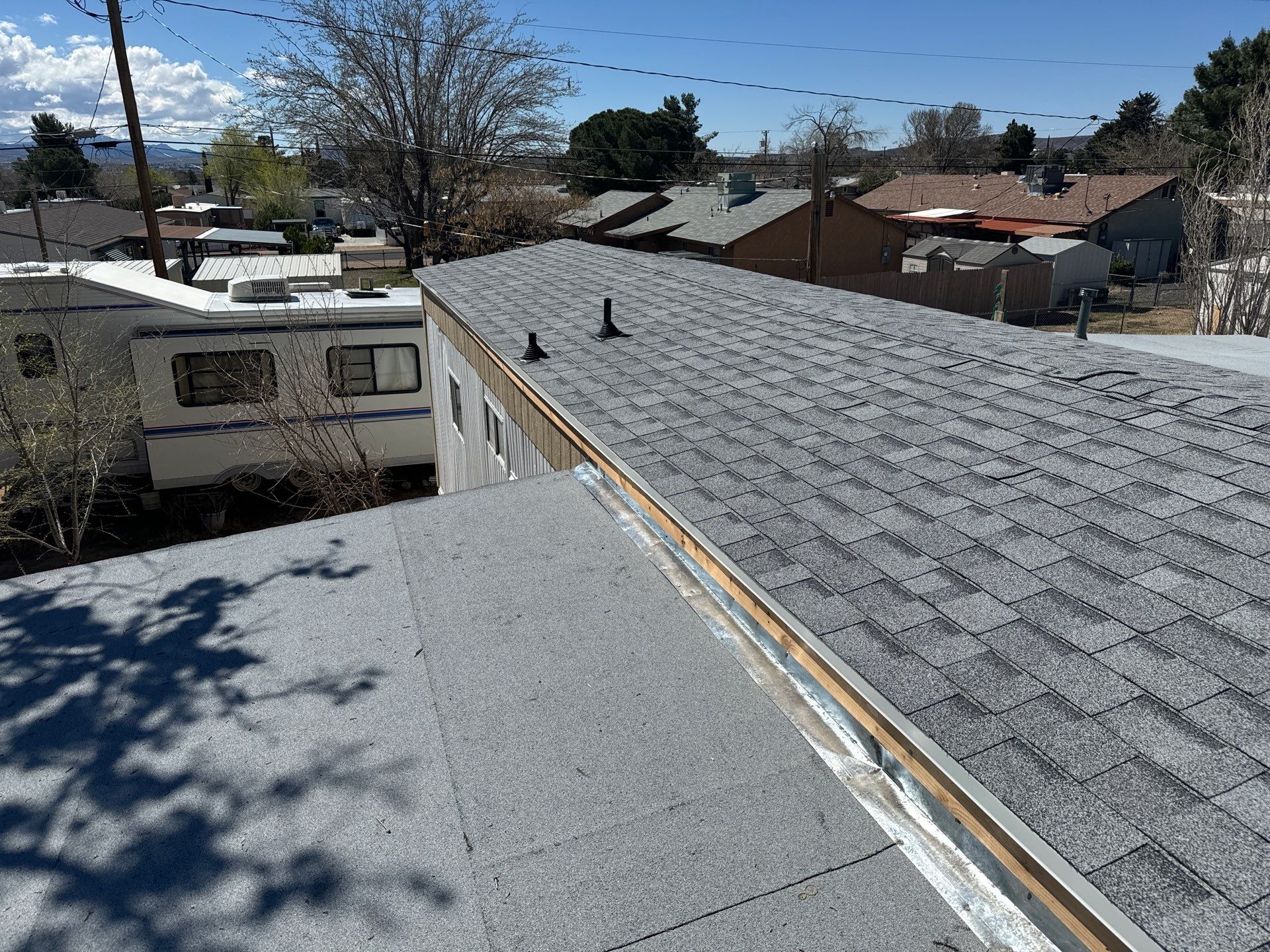 Estate Gray Shingles by Reimagine Roofing