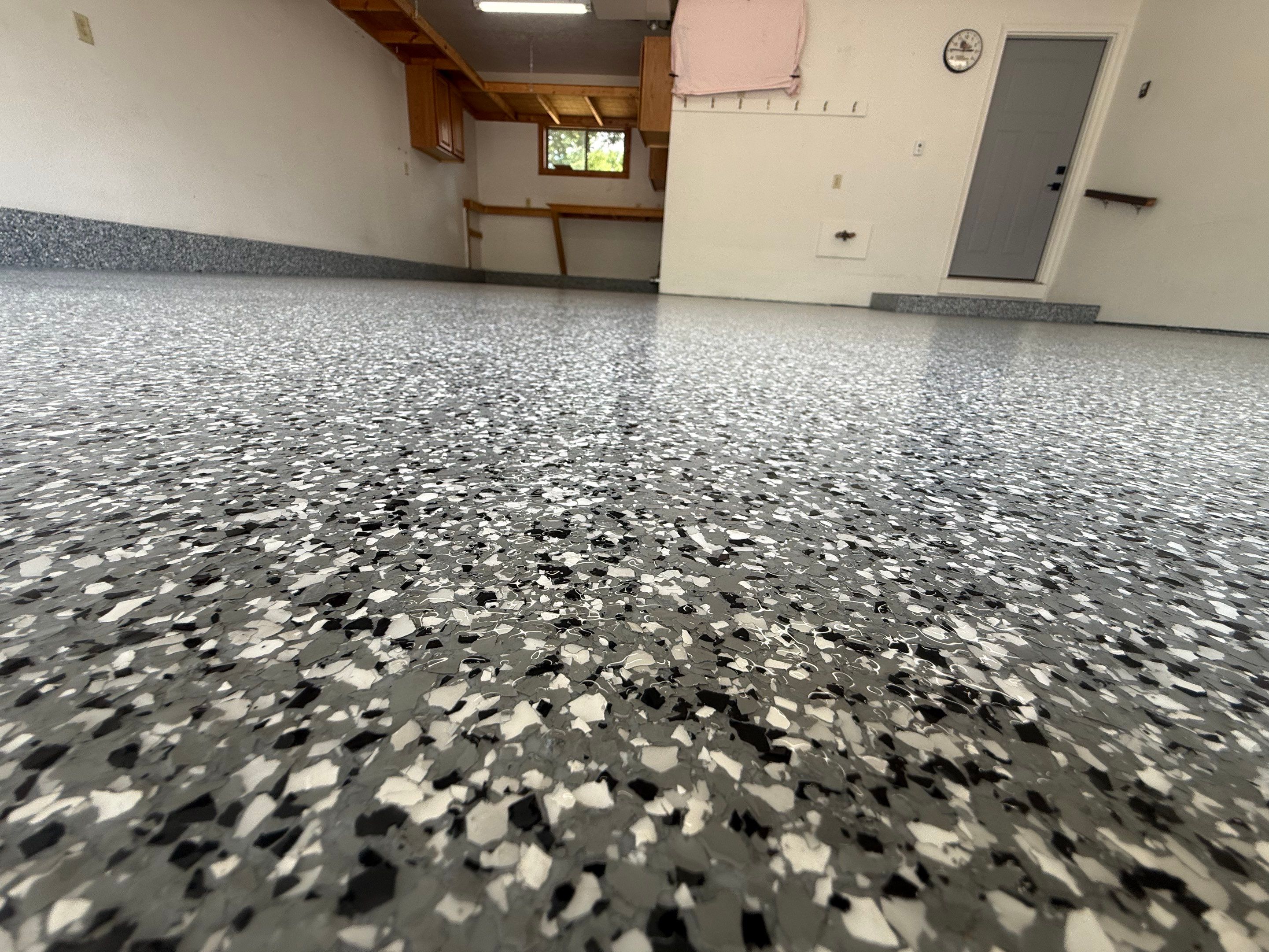 Smoke Flake Garage Floor Coating in Dell Rapids by Select Painting, Coatings & Garage Cabinets