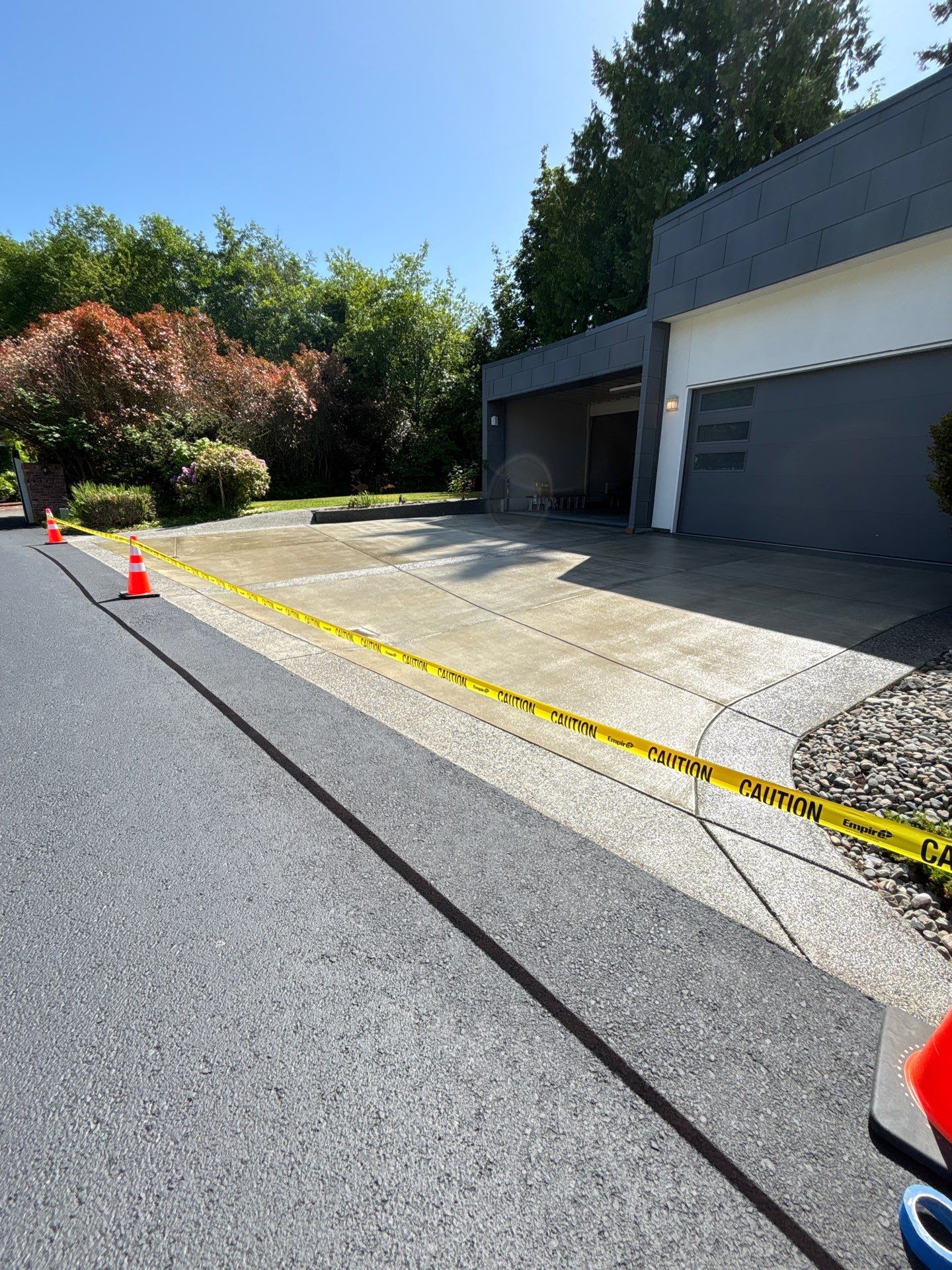 Sealcoated Concrete & Asphalt Driveway | Everett  by Jireh Asphalt & Concrete Inc 