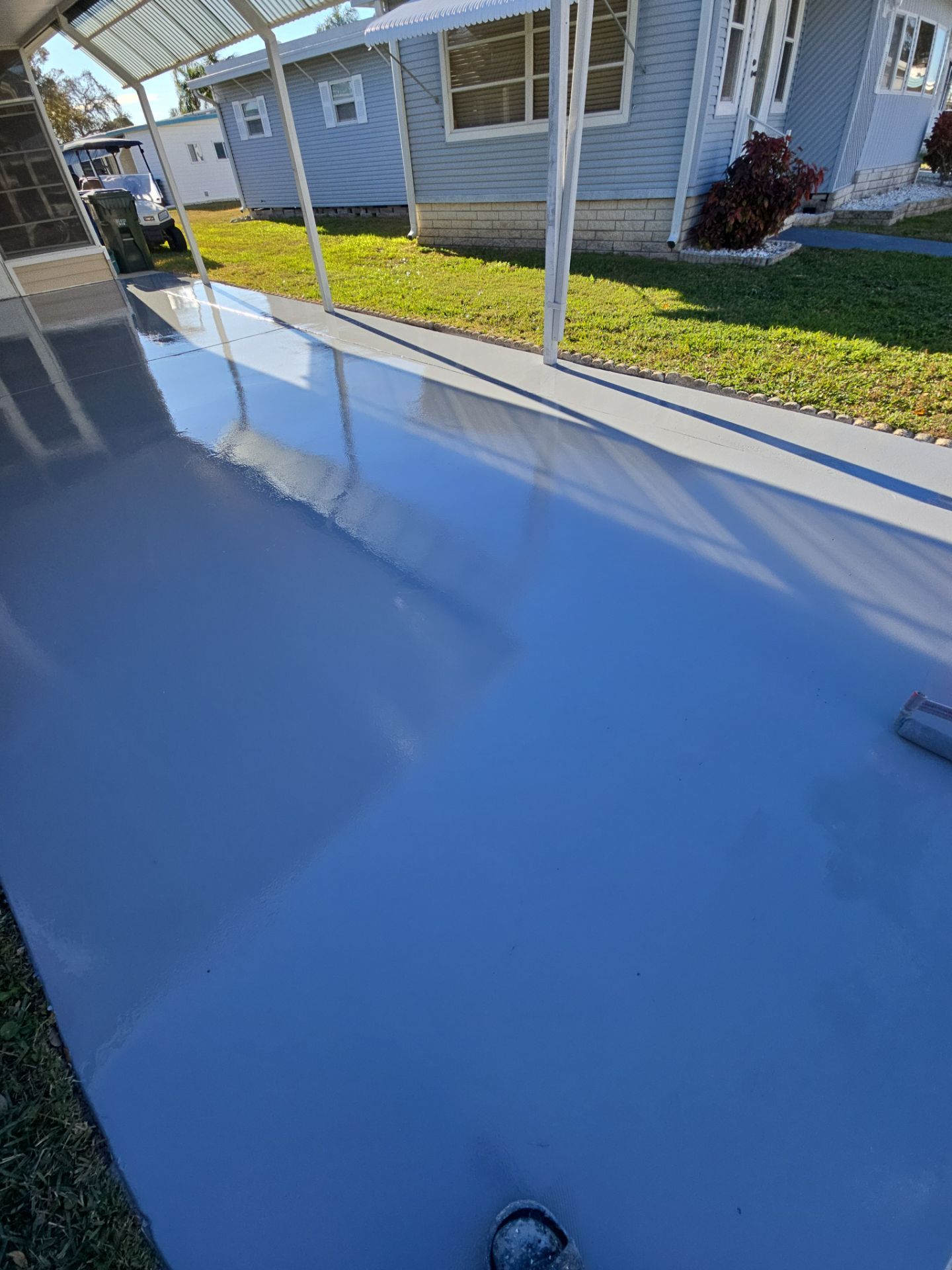 Largo, FL Driveway Concrete Coating by Performance Floors & Coating