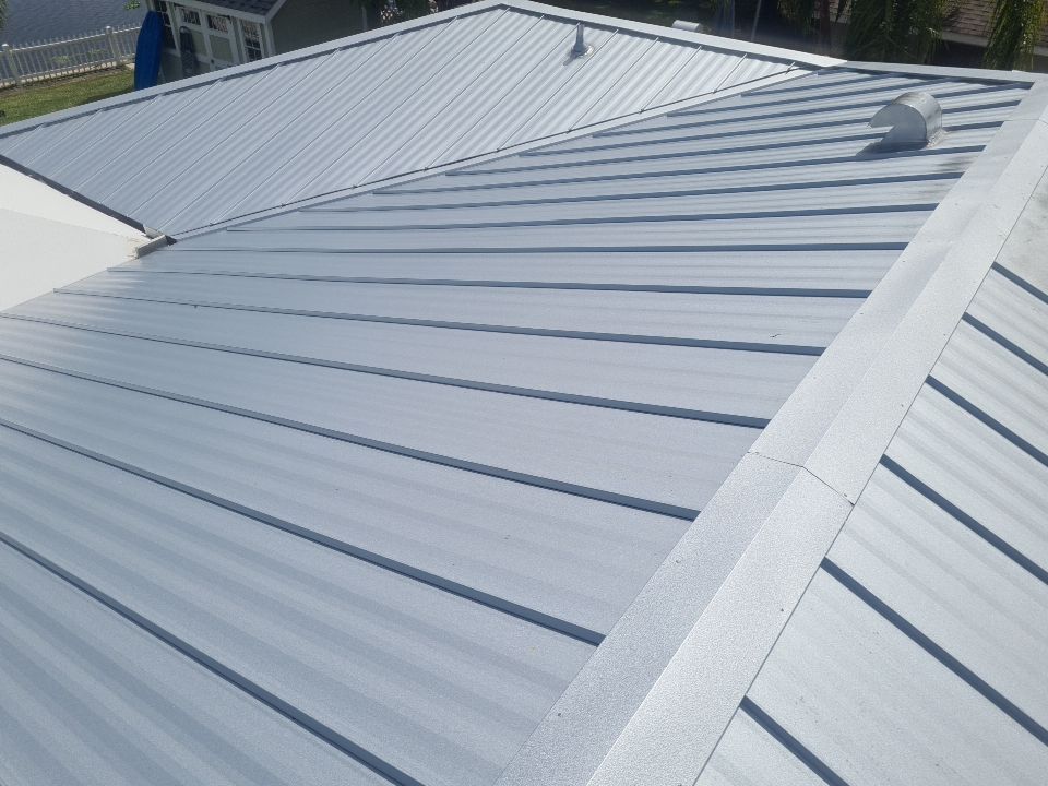 Residential Roofing Installation using 1" Nail strip metal roof by BLUES BROTHERS ROOFING