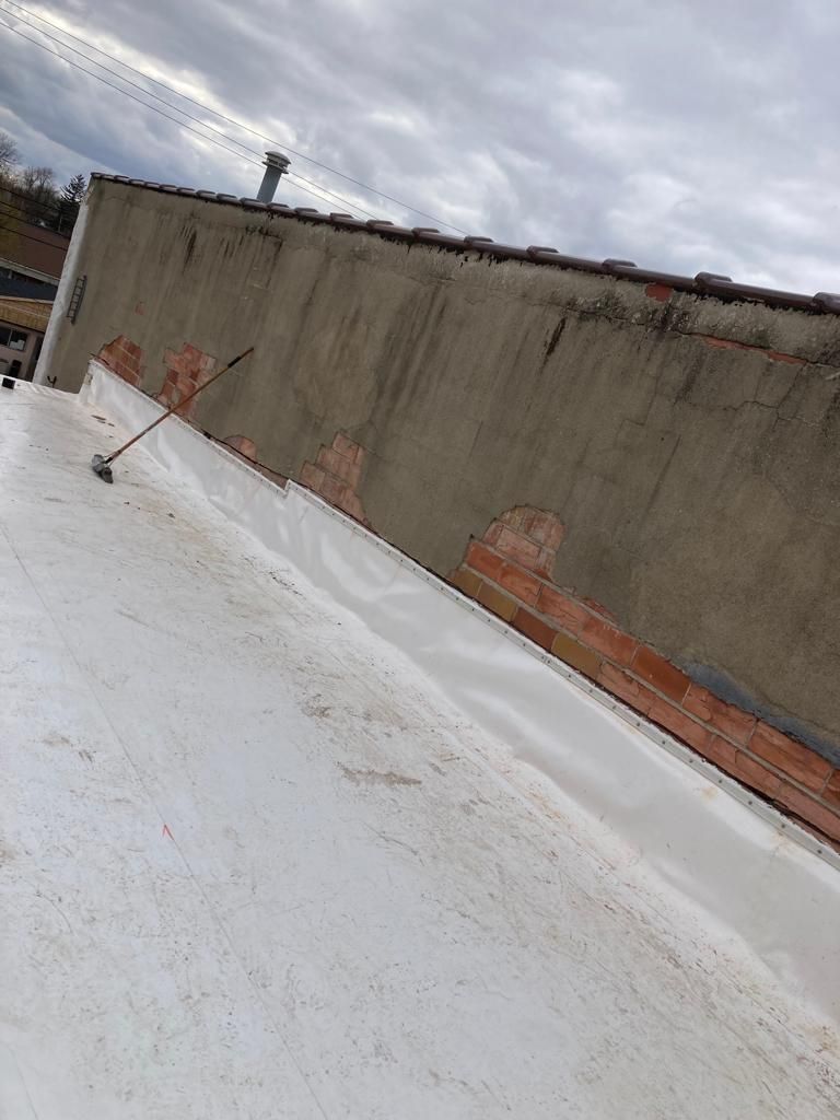 Roof Recover on a downtown building in Lake City  by Grell Roofing, LLC