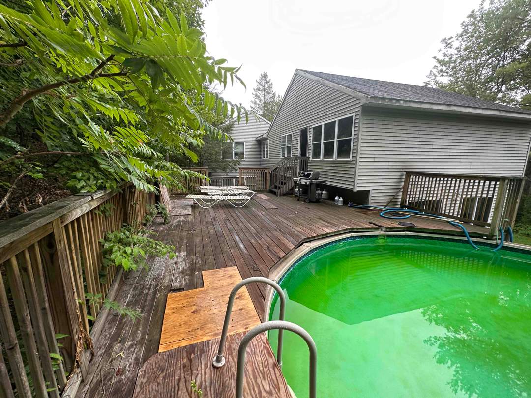 Pool Deck replacement, Trex Tropical Island Mist , Black Transcend railing. by DiGiorgi Roofing and Siding Inc