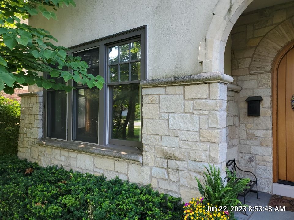 Northbrook, IL stucco home soft wash and stone cleaning by Northern Power Washing LLC.