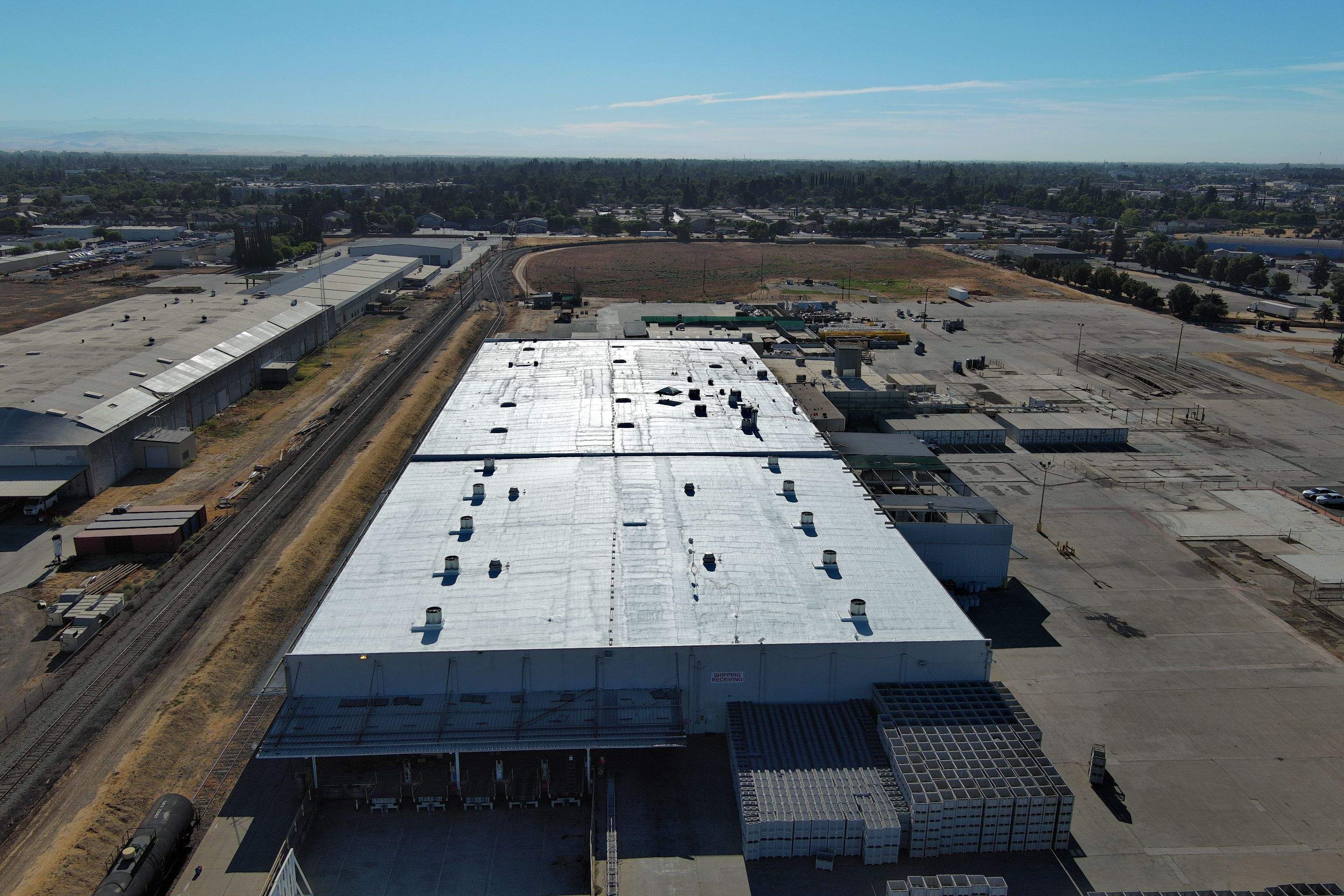 Pro Farms Spray foam roofing project by Straight Edge Roofing Inc