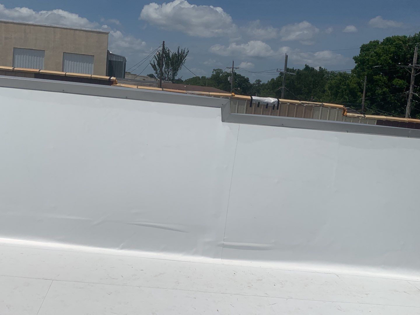 Commercial Roofing Installation in DeQueen, AR, using 50 mil PVC by Hostetler Roofing