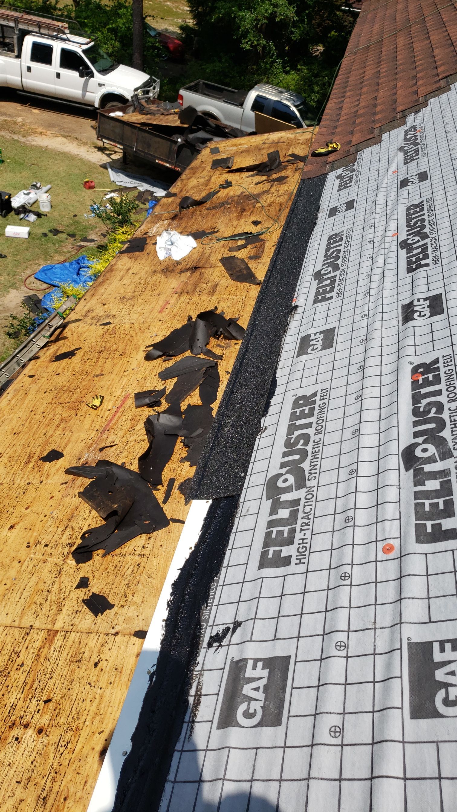 Residential Roofing Installation using Roof Replacement by American Roofing & Construction LLC