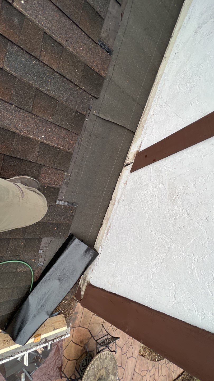 Step flashing repair on roof to wall by Pro Home Services Inc