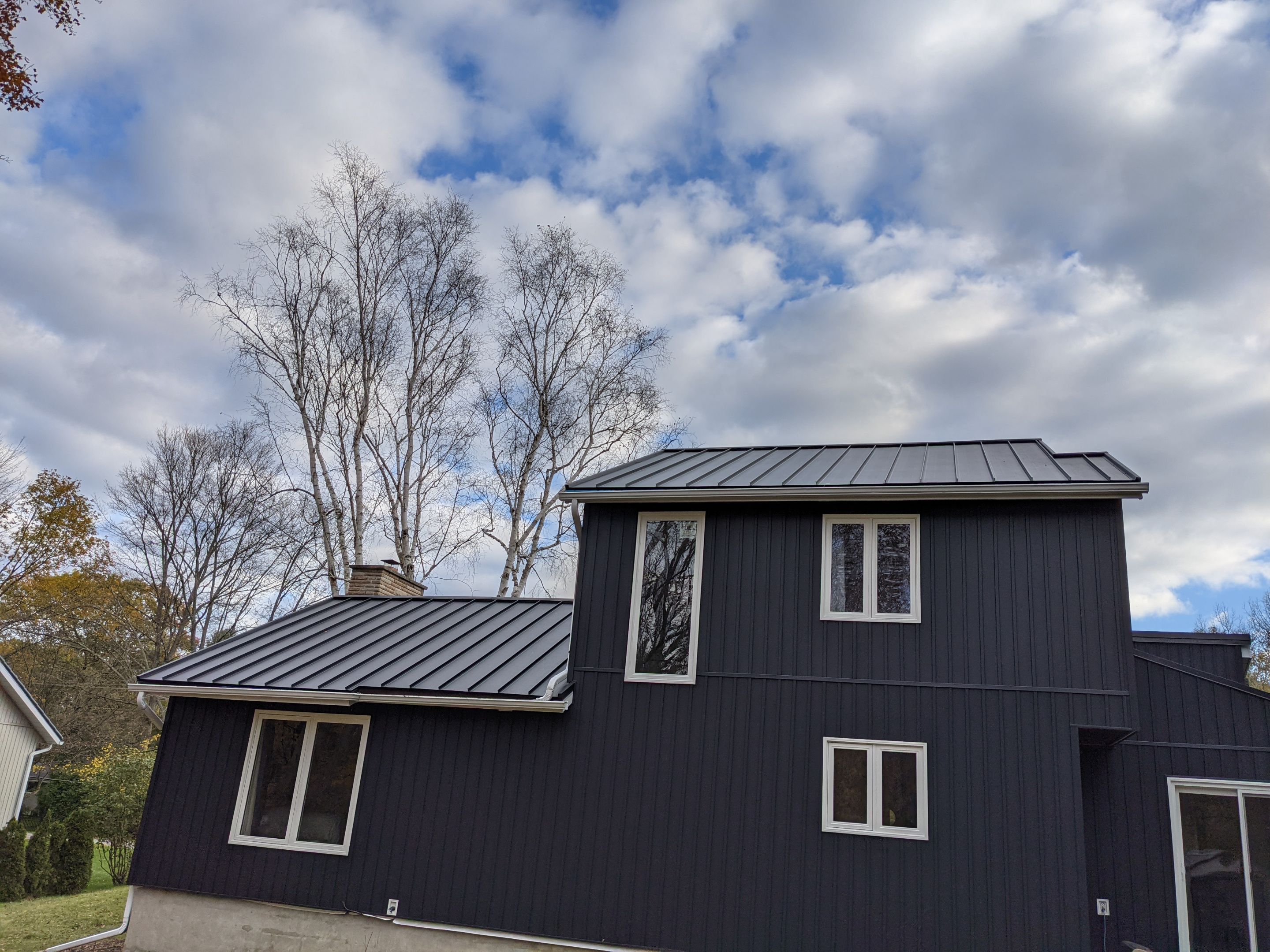 Residential Roofing Installation using 16" Standing Seam Panels by Jay Carter Roofing & Sheet Metal