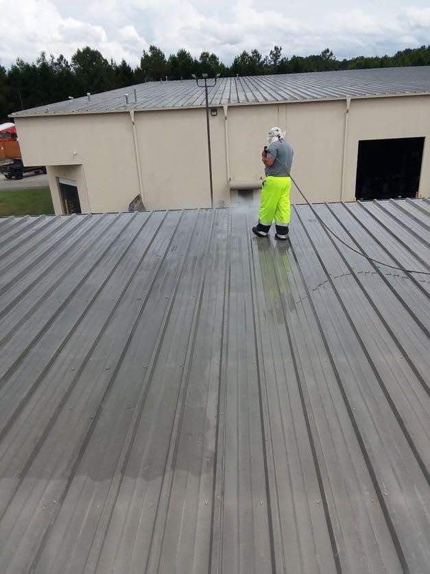 122,220 SQ Ft Standing Seam Metal Roof Restoration in Buford by Southern Roof Solutions
