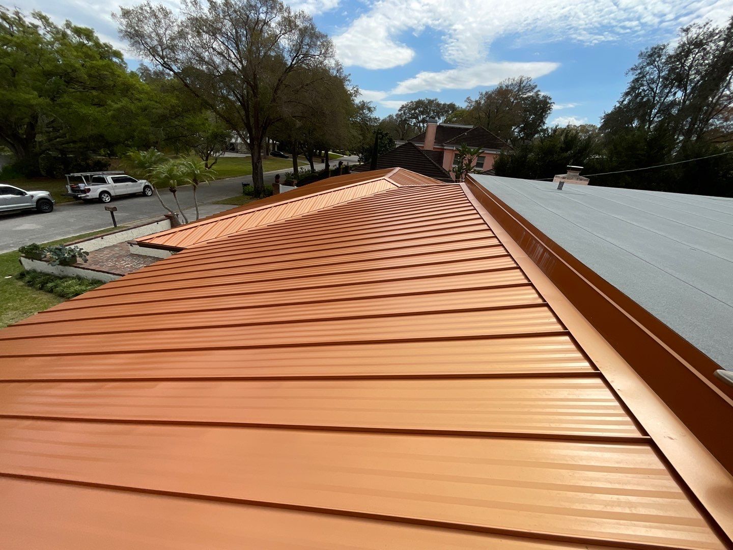 Residential Re-Roof using MS Metals, Copper Penny, Standing Seam. by First Due Roofing
