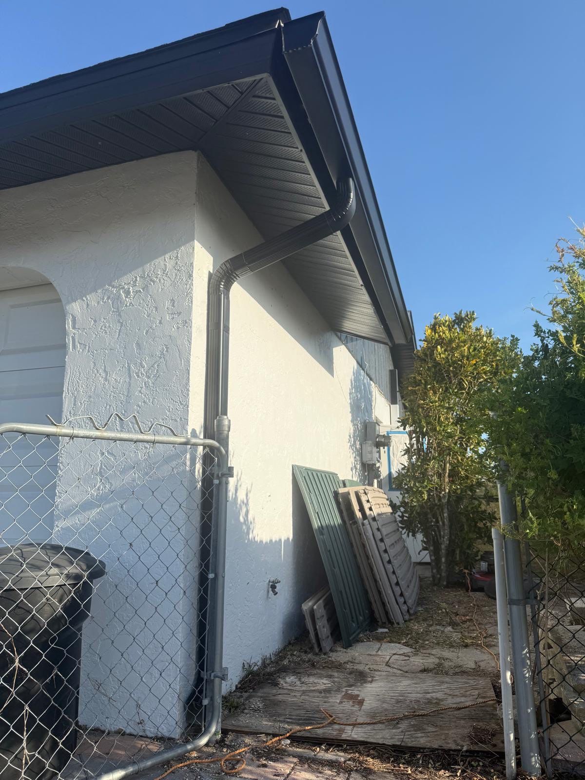 New Downspouts and Splash Guards in Sarasota FL by Gutter Professors